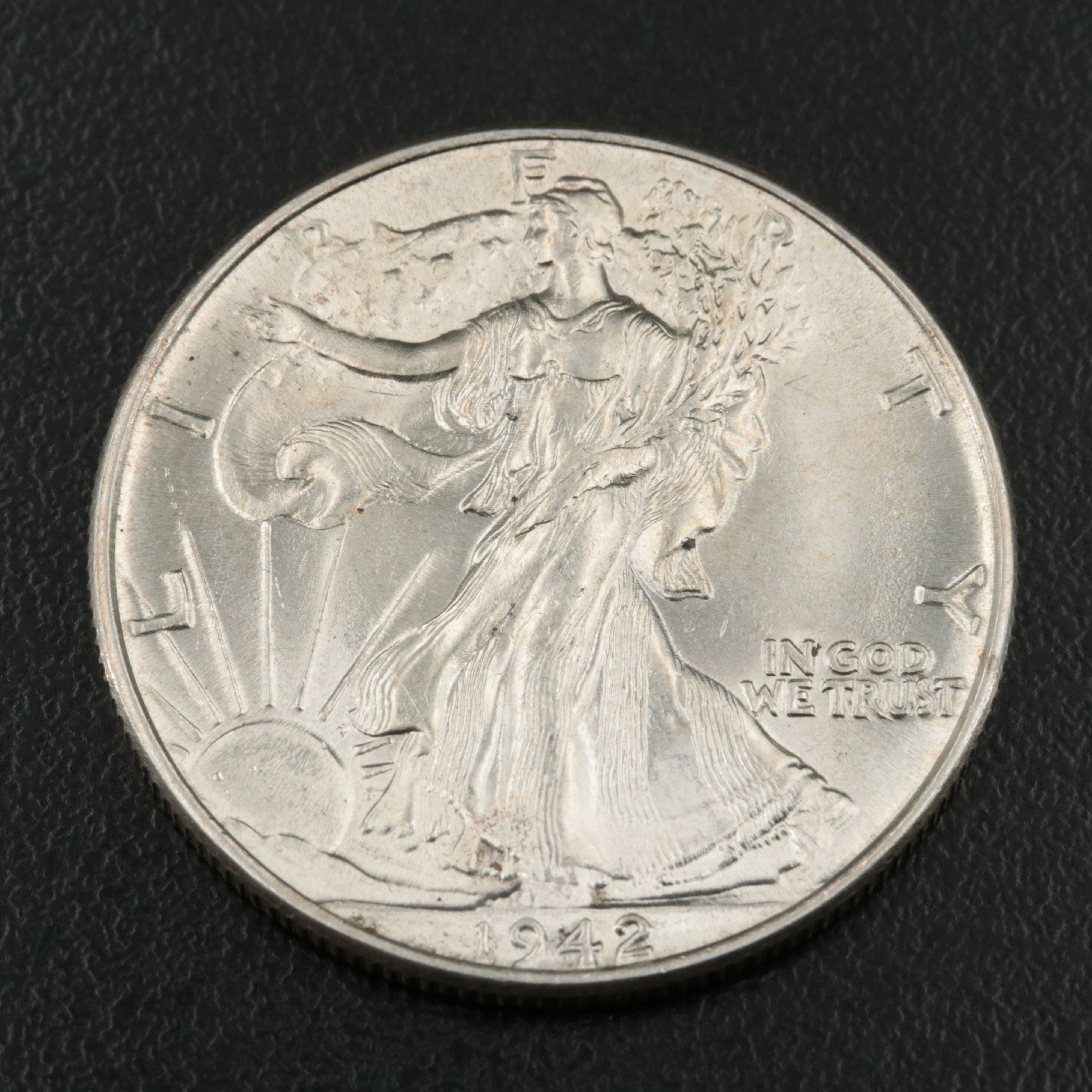 1942 and 1943-D Uncirculated Walking Liberty Half Dollars