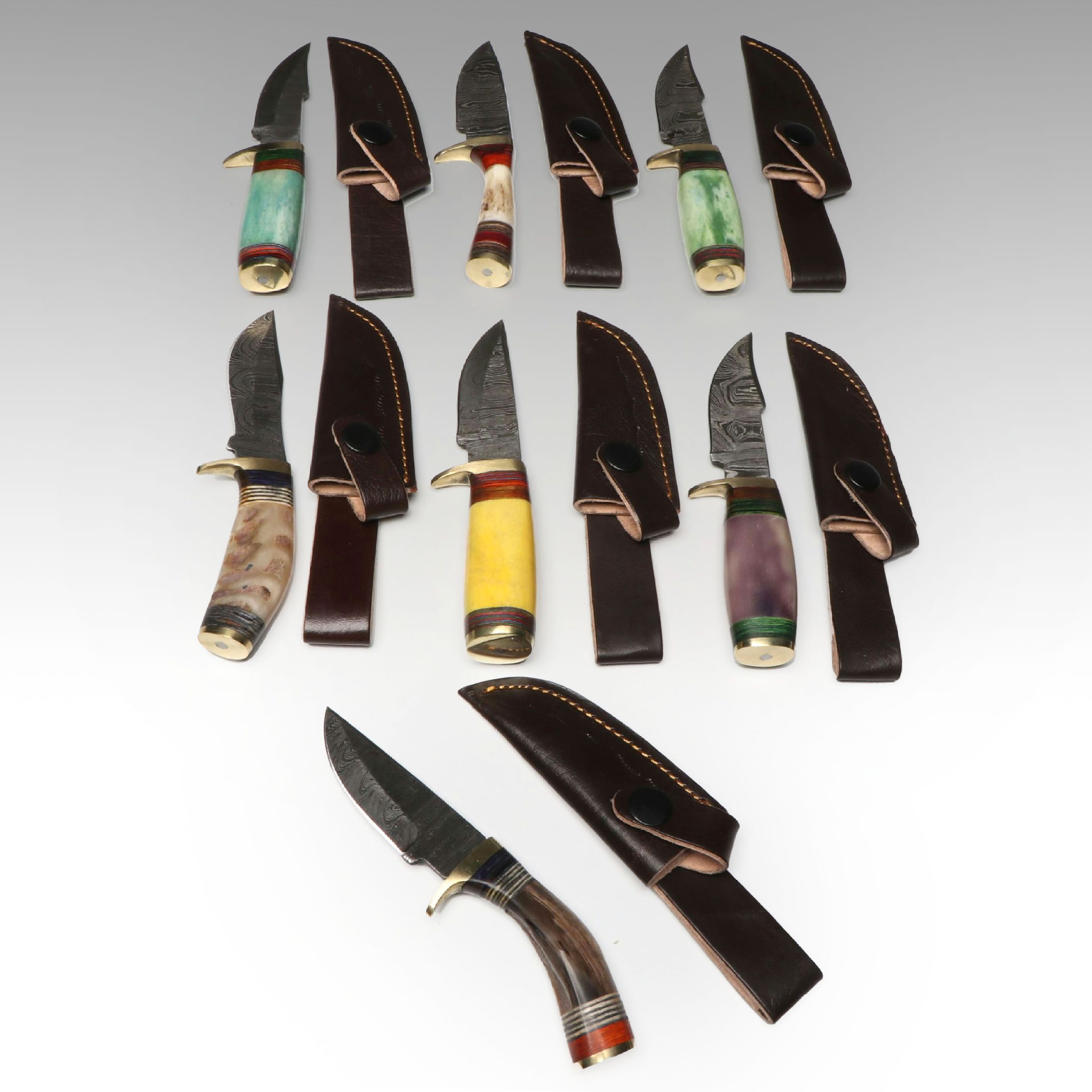 Damascus Steel Skinner Knives in Leather Scabbards