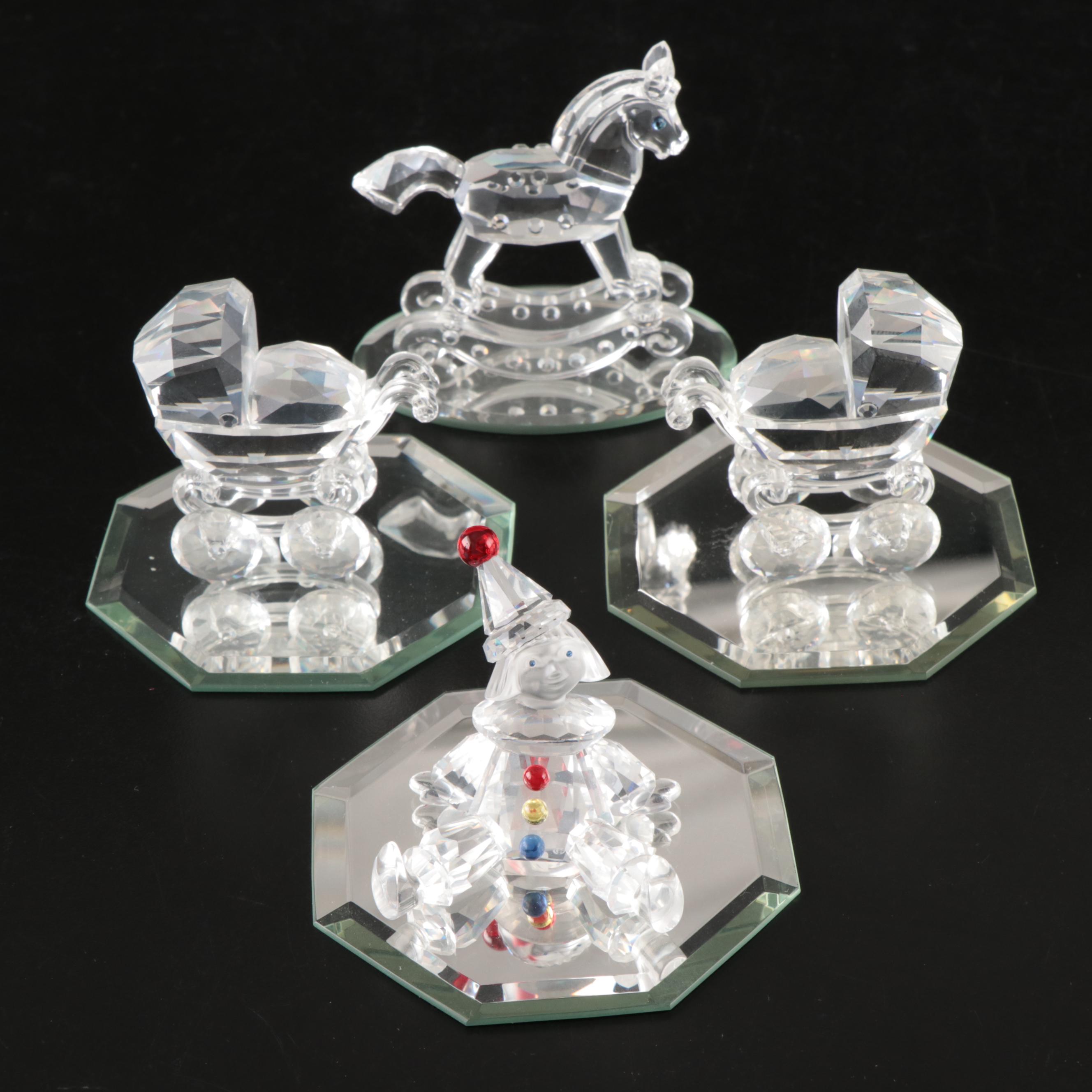 Swarovski Crystal Rocking Horse, Baby Stroller, and Clown Figurines