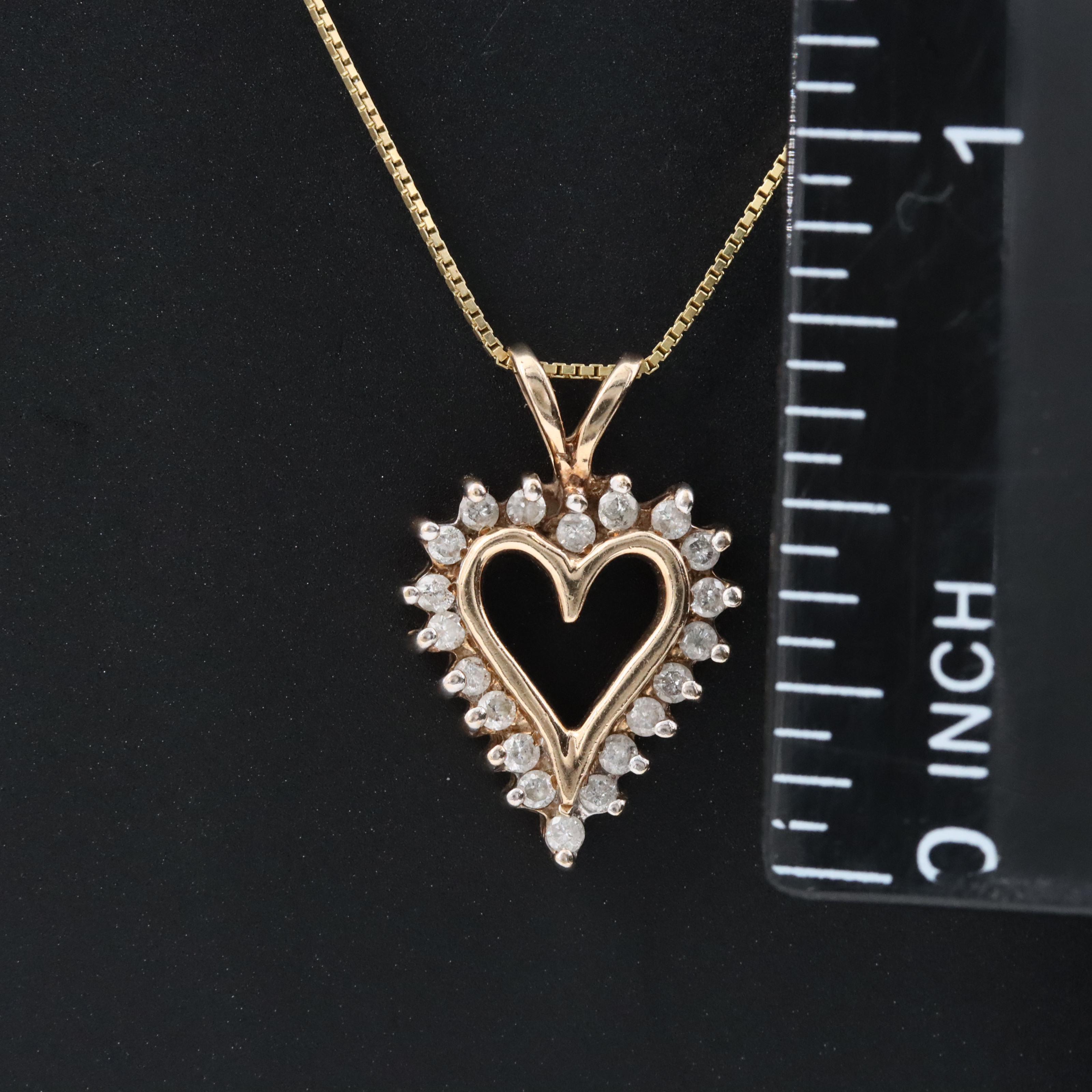 10K 0.25 CTW Diamond Heart Pendant with 14K Chain