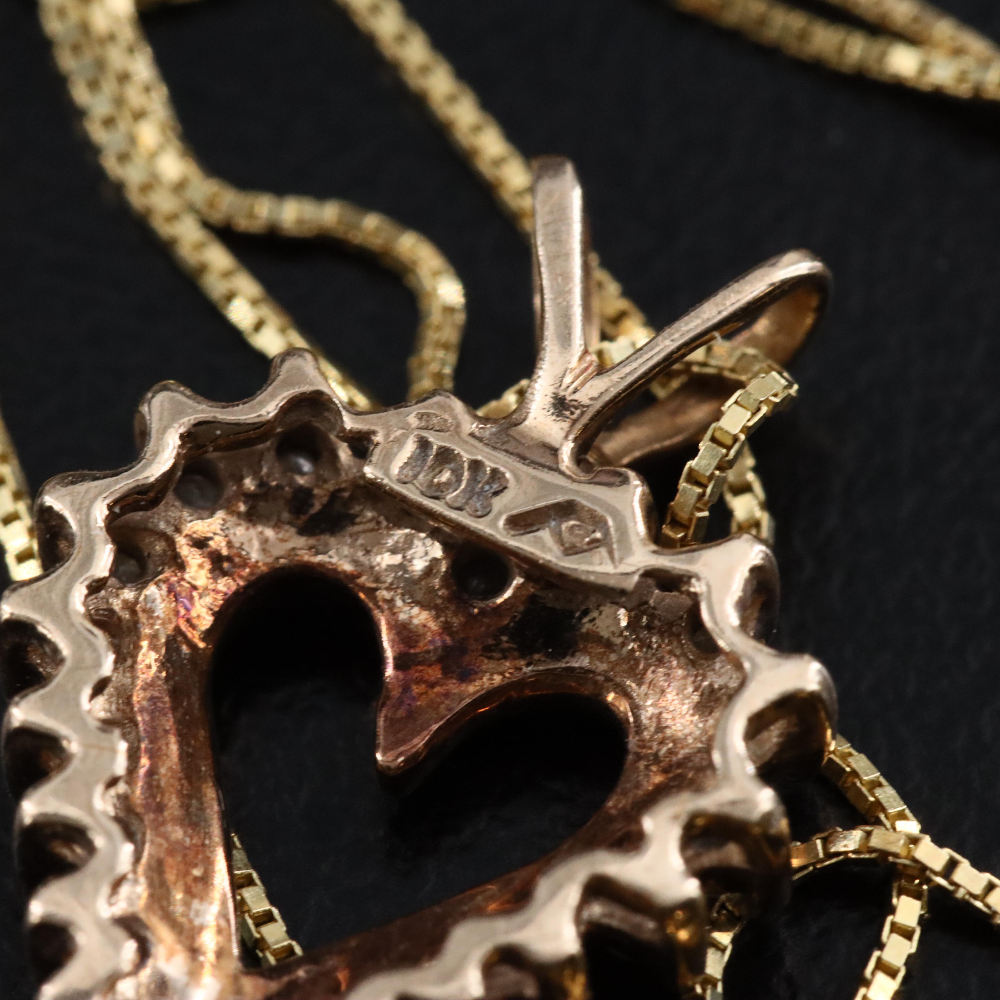 10K 0.25 CTW Diamond Heart Pendant with 14K Chain