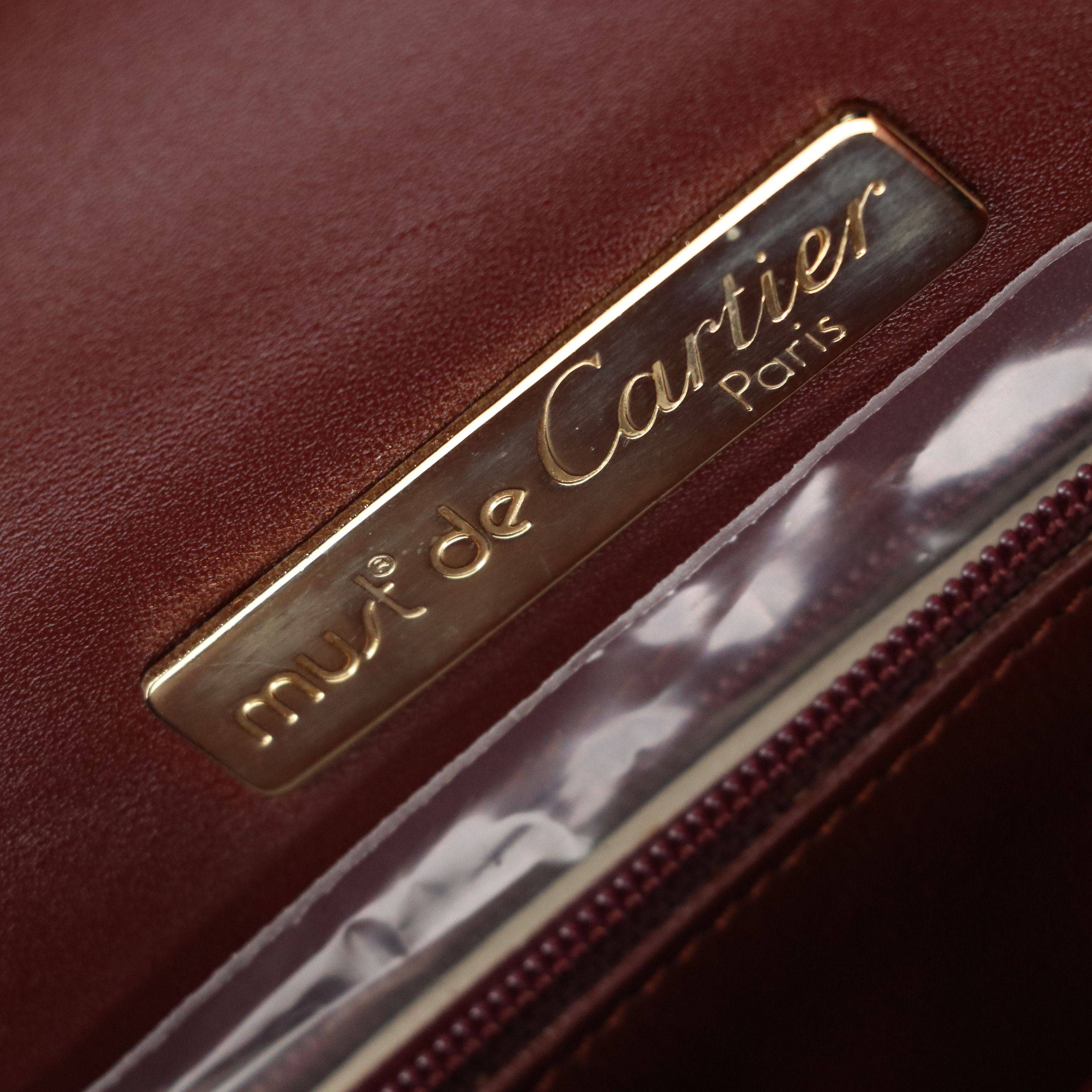 Cartier Must de Cartier Curved Flap Clutch in Burgundy Leather