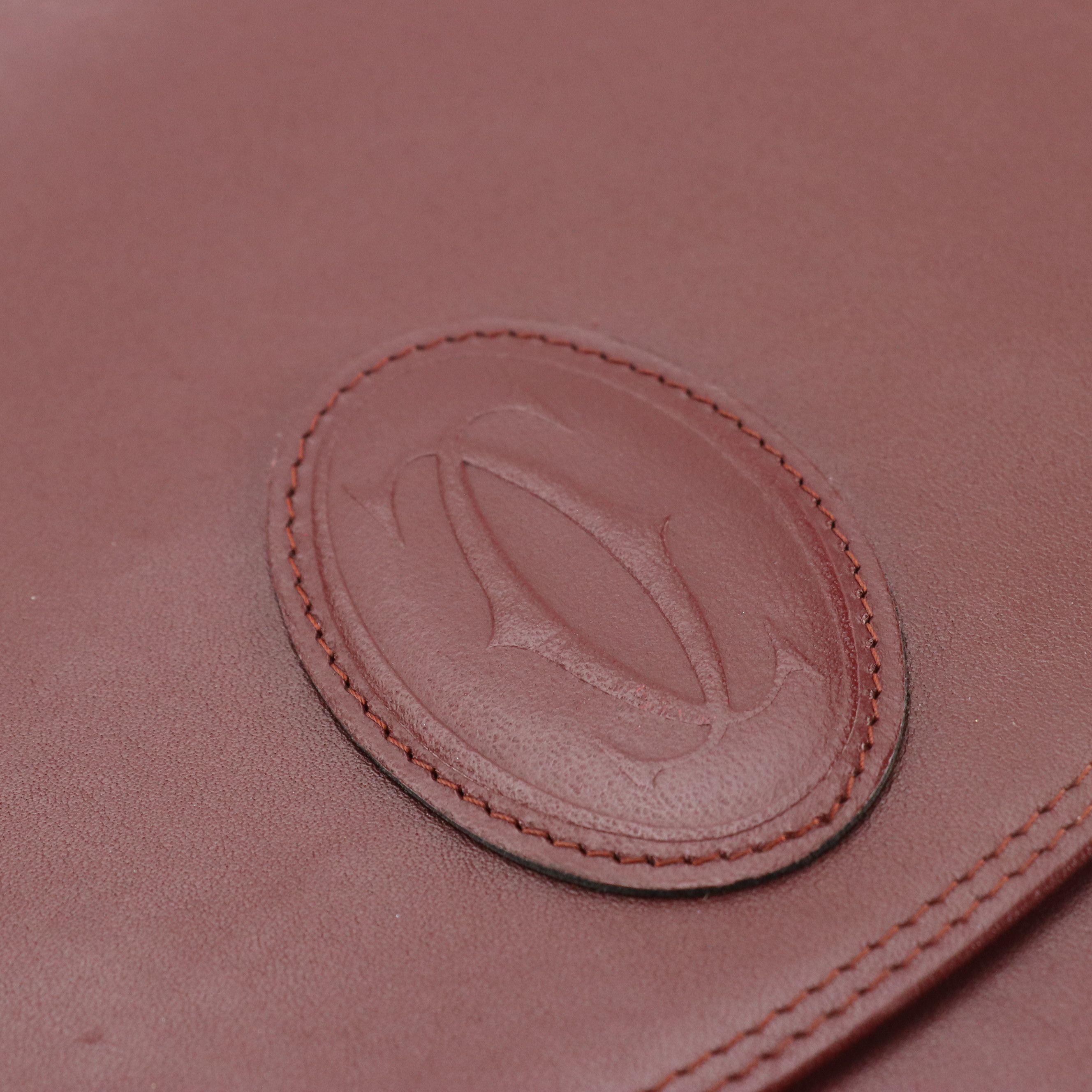 Cartier Must de Cartier Curved Flap Clutch in Burgundy Leather