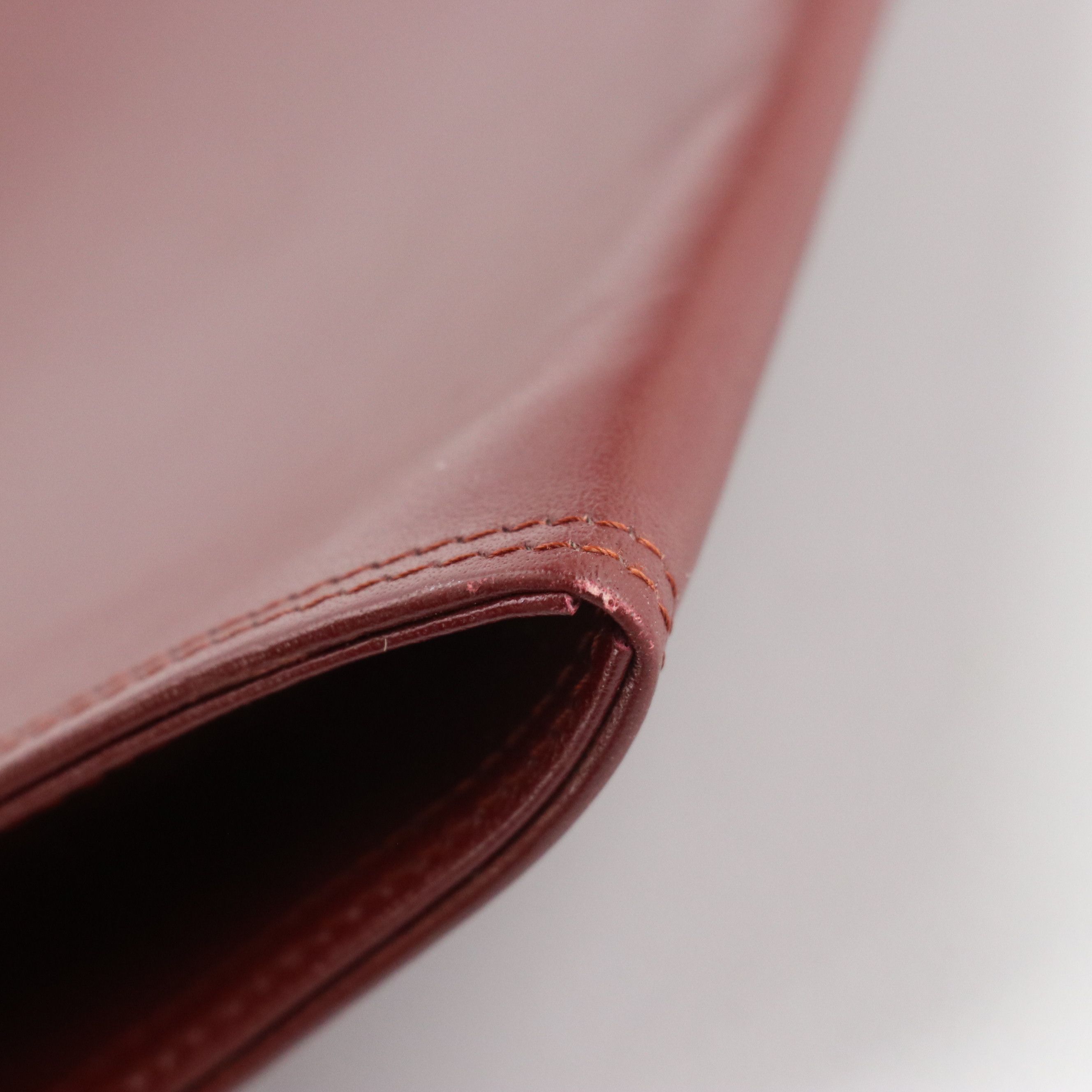 Cartier Must de Cartier Curved Flap Clutch in Burgundy Leather