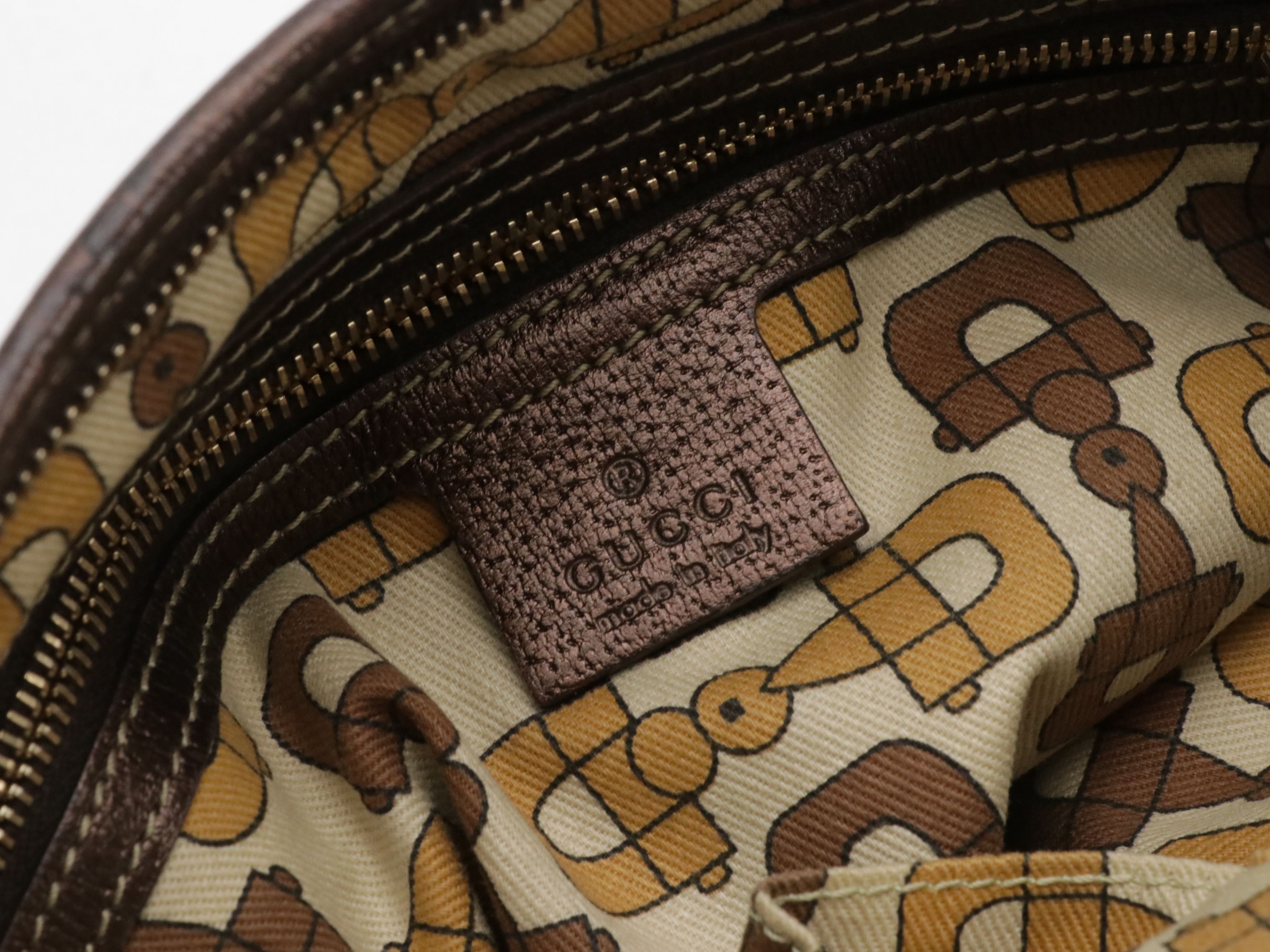 Gucci Jolicoeur Charm Crossbody Bag in GG Canvas and Bronze Leather