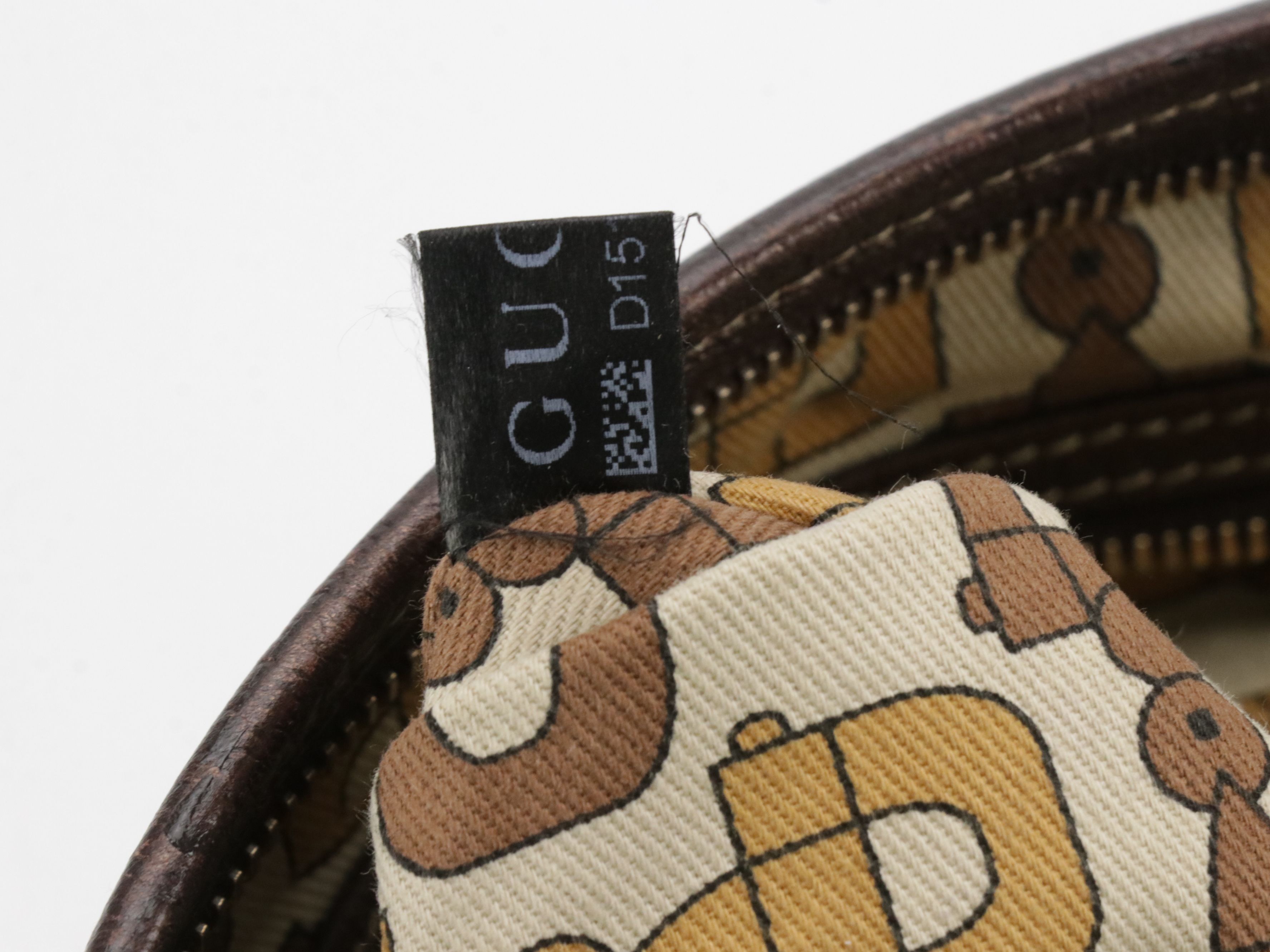 Gucci Jolicoeur Charm Crossbody Bag in GG Canvas and Bronze Leather