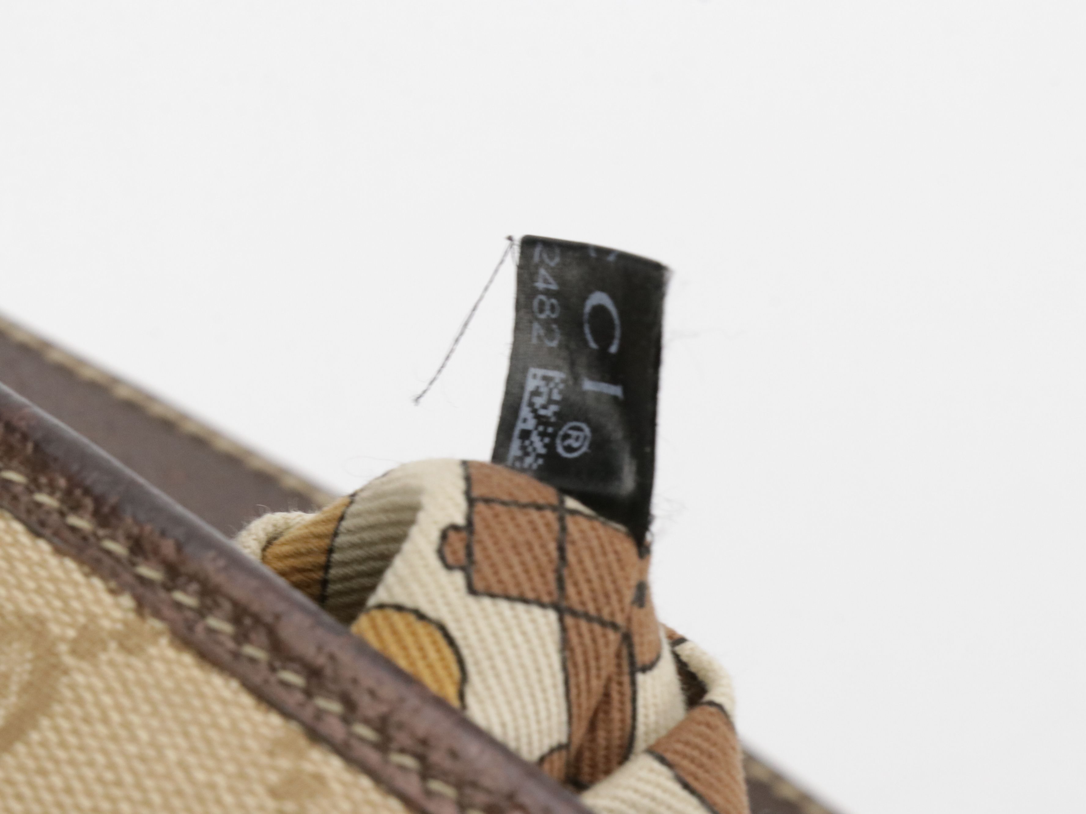 Gucci Jolicoeur Charm Crossbody Bag in GG Canvas and Bronze Leather