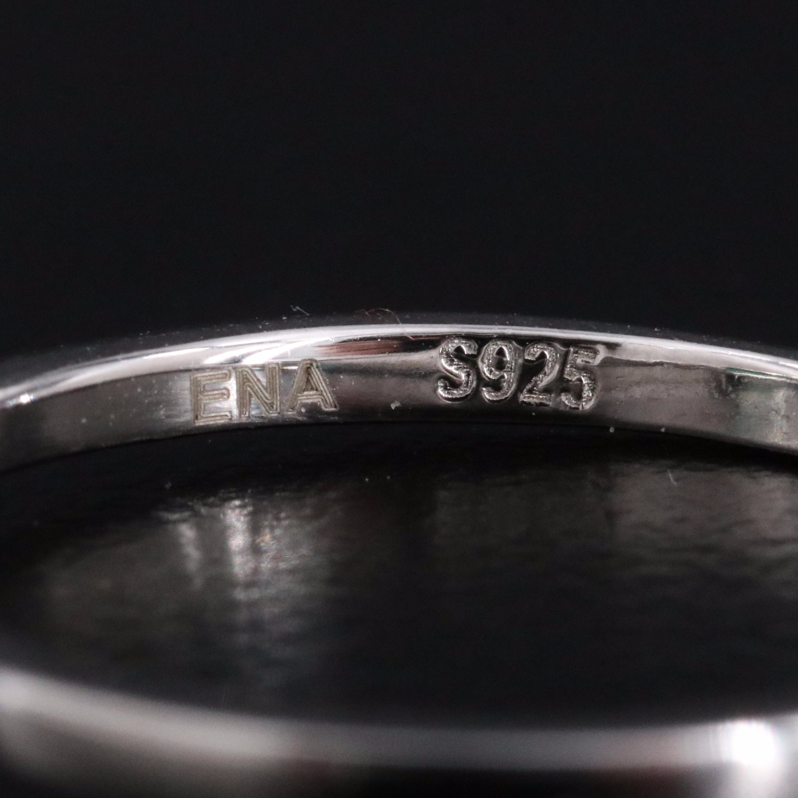 Sterling Emerald and Moissanite Ring