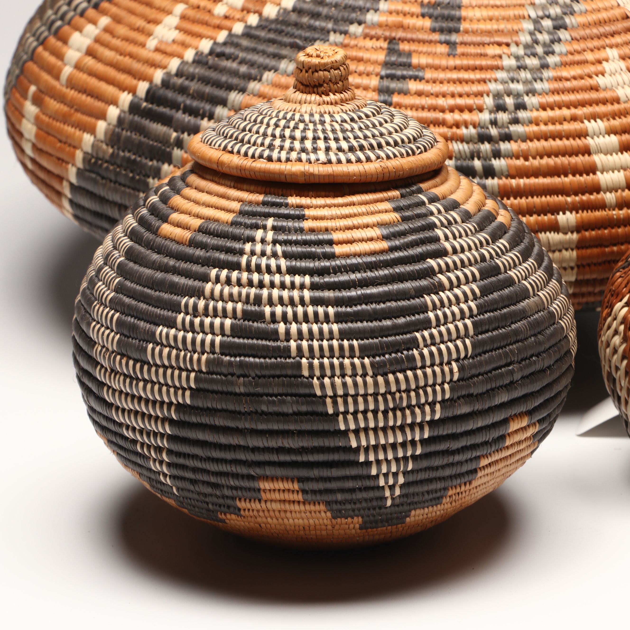 Hlenglwo Ptiuli with Other Zulu Ilala Palm Basketry and Herb Container