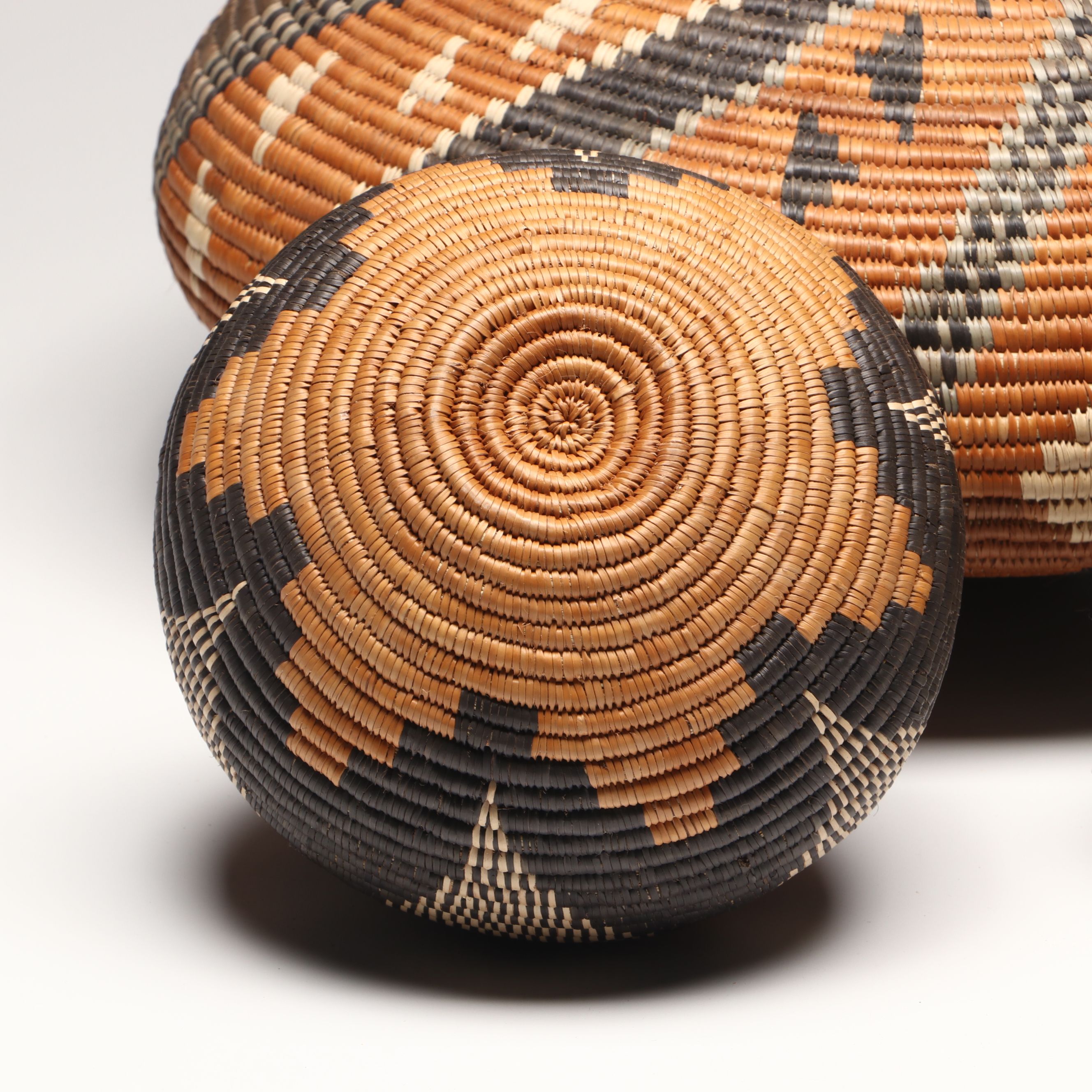 Hlenglwo Ptiuli with Other Zulu Ilala Palm Basketry and Herb Container