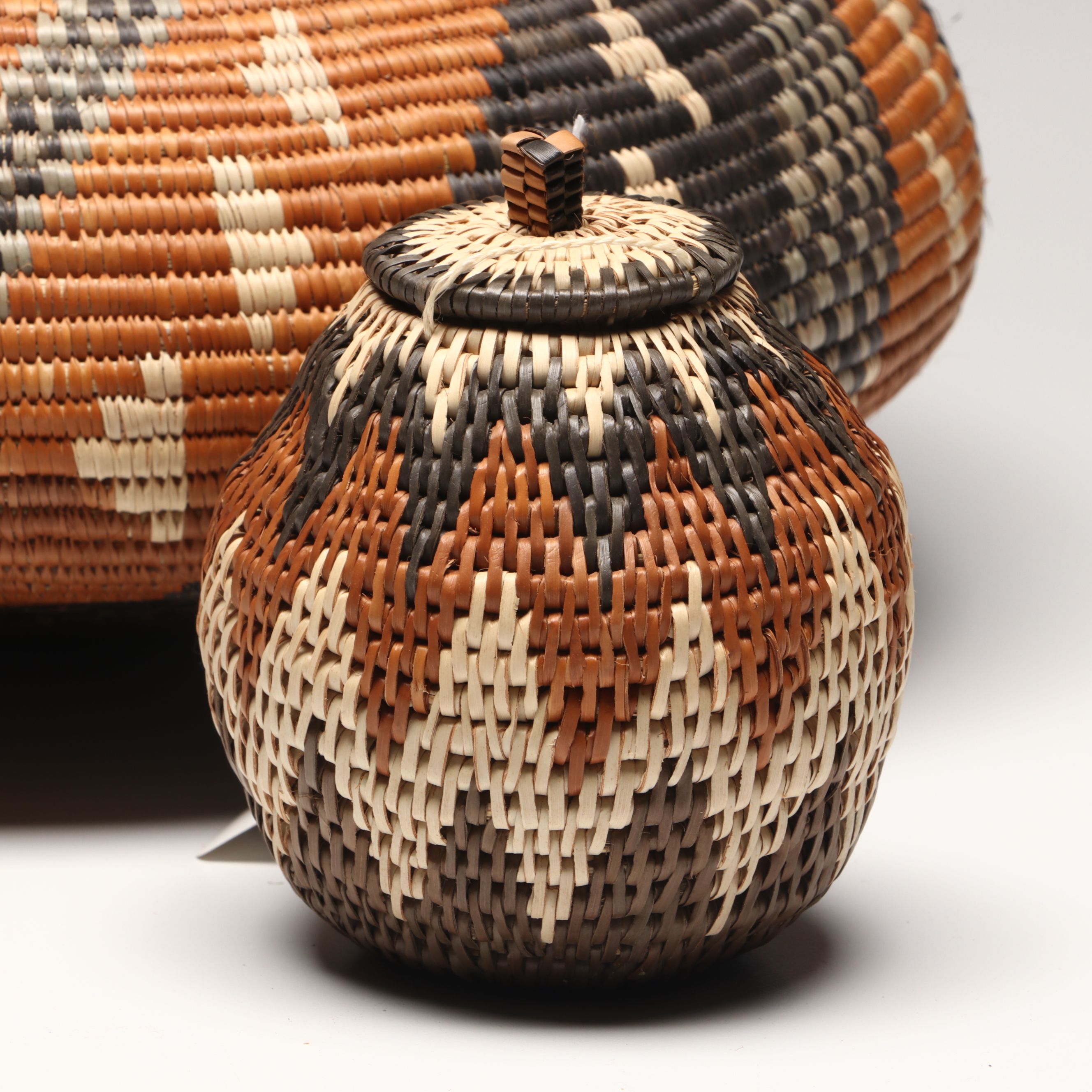 Hlenglwo Ptiuli with Other Zulu Ilala Palm Basketry and Herb Container