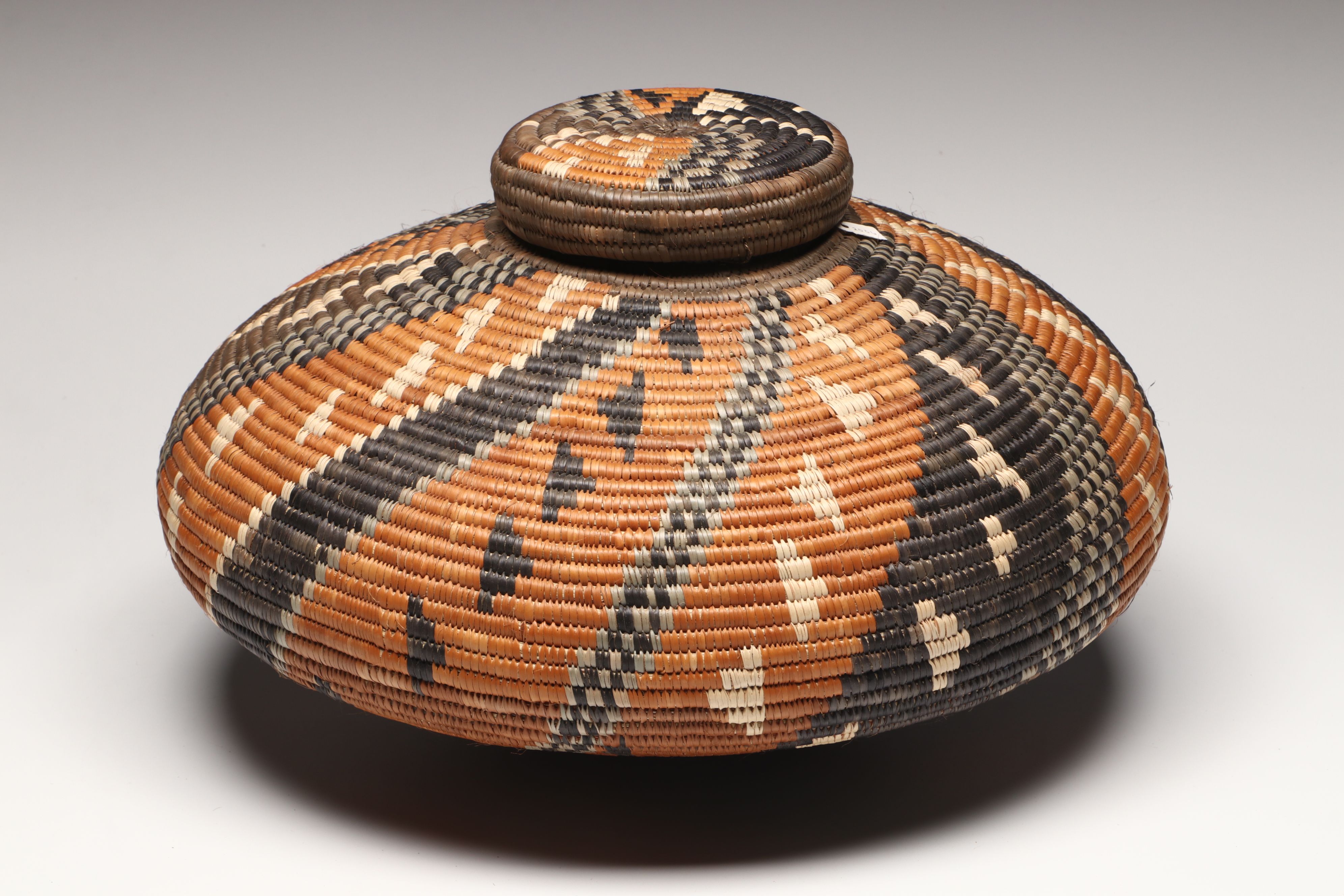 Hlenglwo Ptiuli with Other Zulu Ilala Palm Basketry and Herb Container
