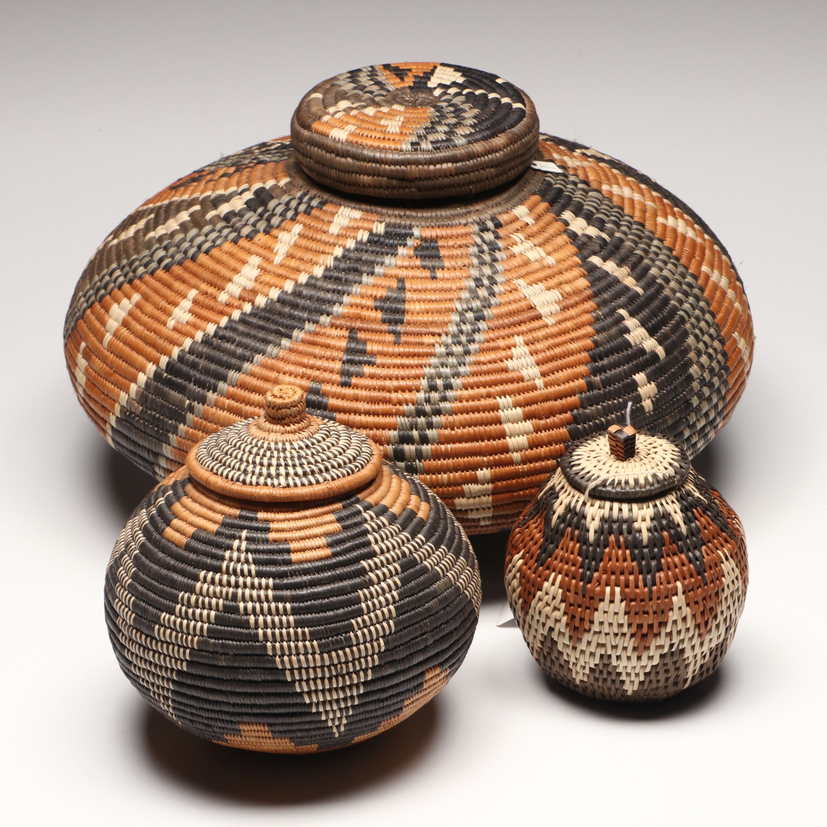 Hlenglwo Ptiuli with Other Zulu Ilala Palm Basketry and Herb Container