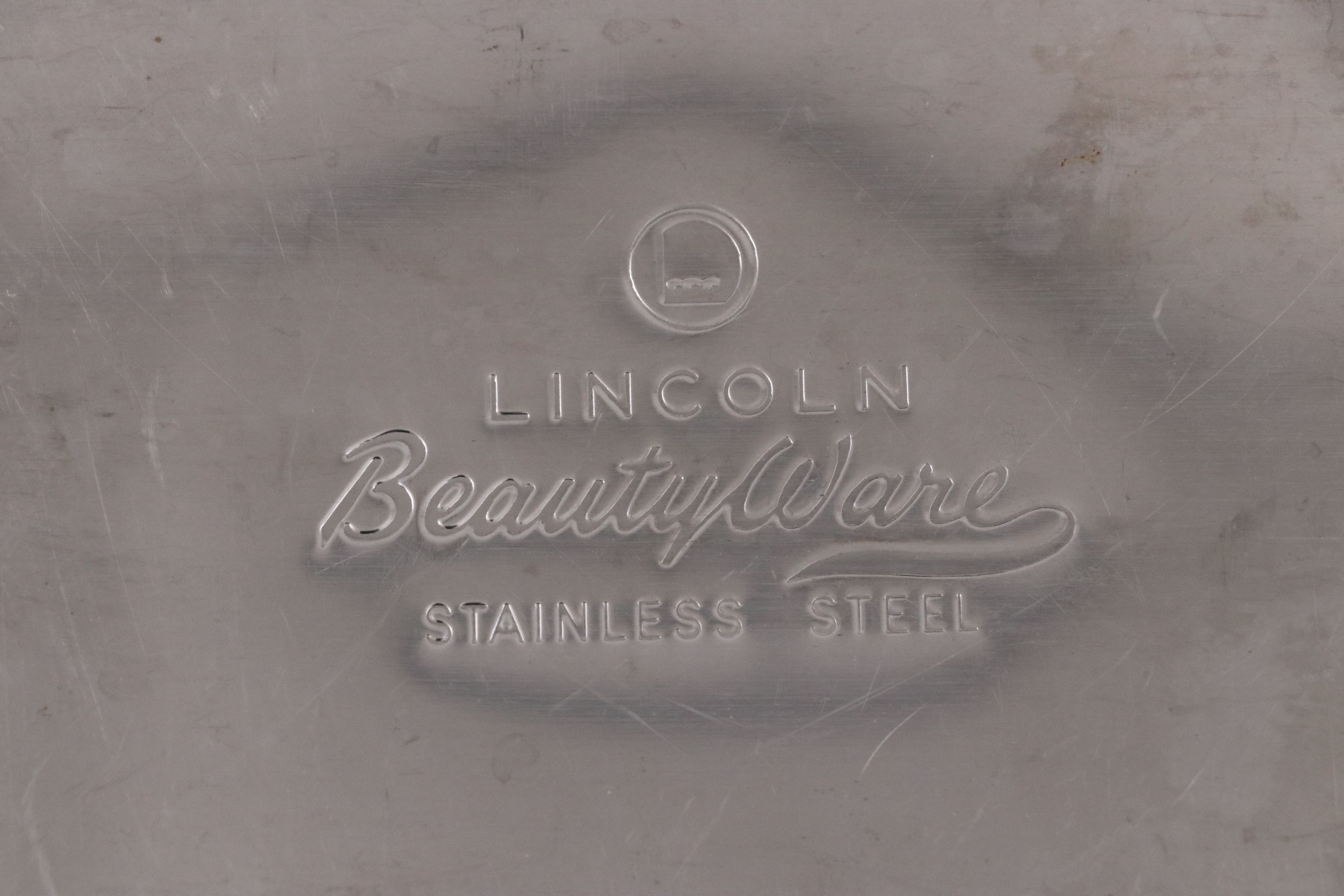 Mid Century Modern Lincoln Canisters with Orleans Stainless Flatware