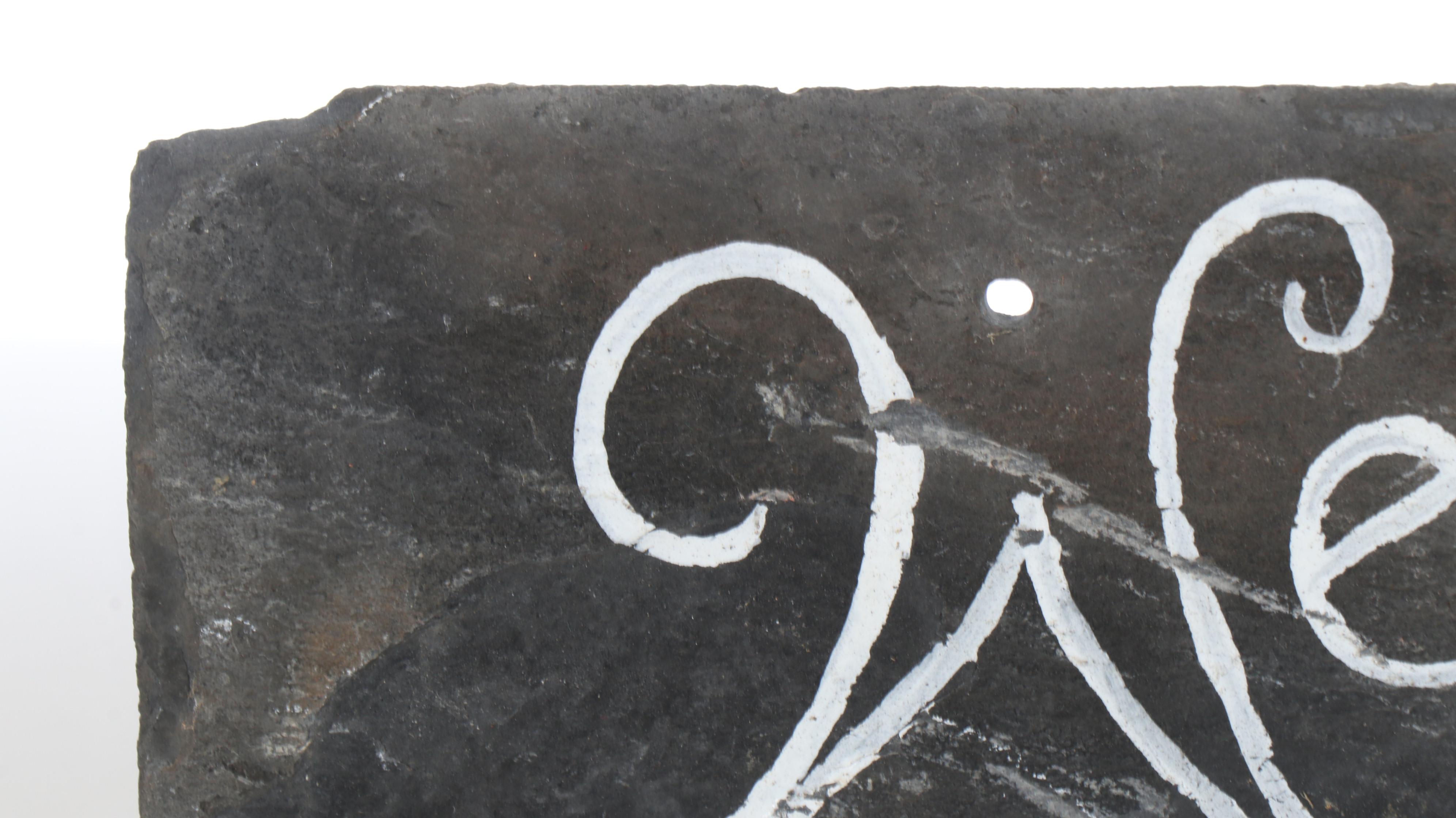 Hand-Painted Slate Welcome Sign with Cylindrical Glass Floor Vase