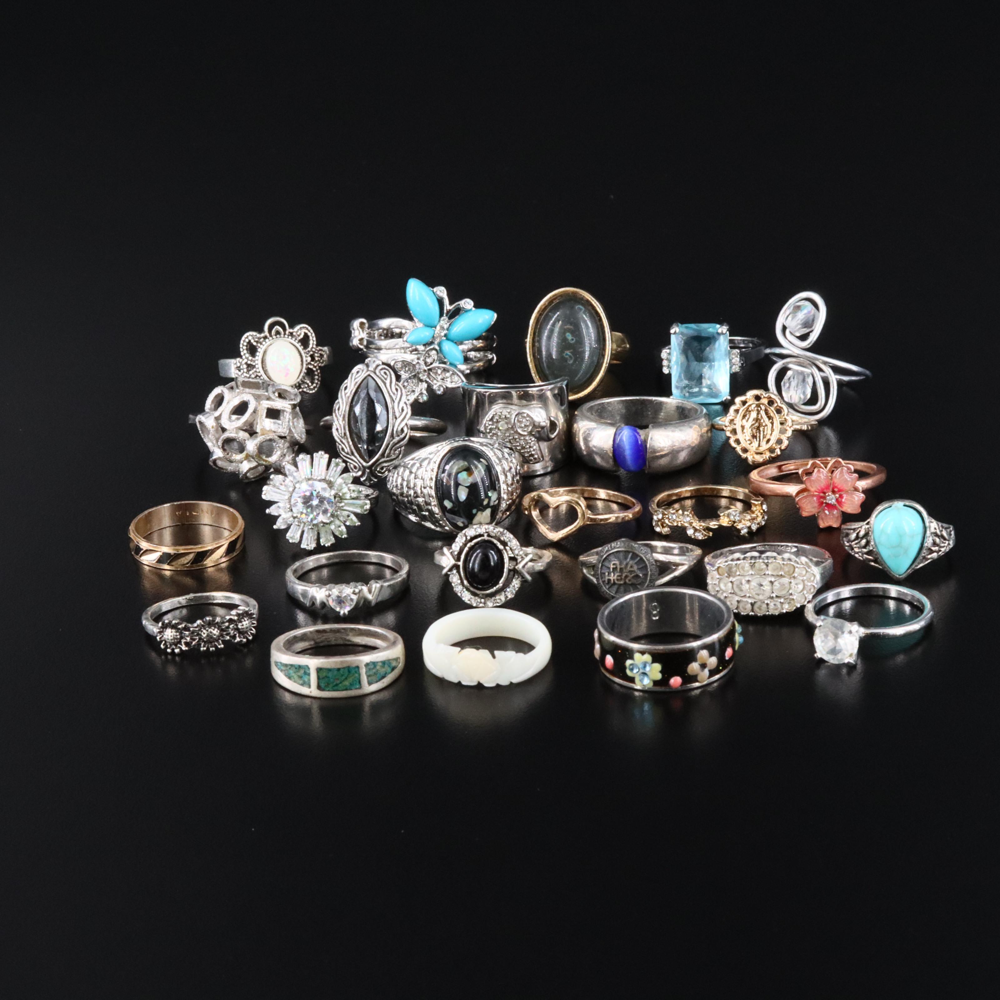 Spinner Ring, Floral Motifs and Navette Featured in Ring Collection