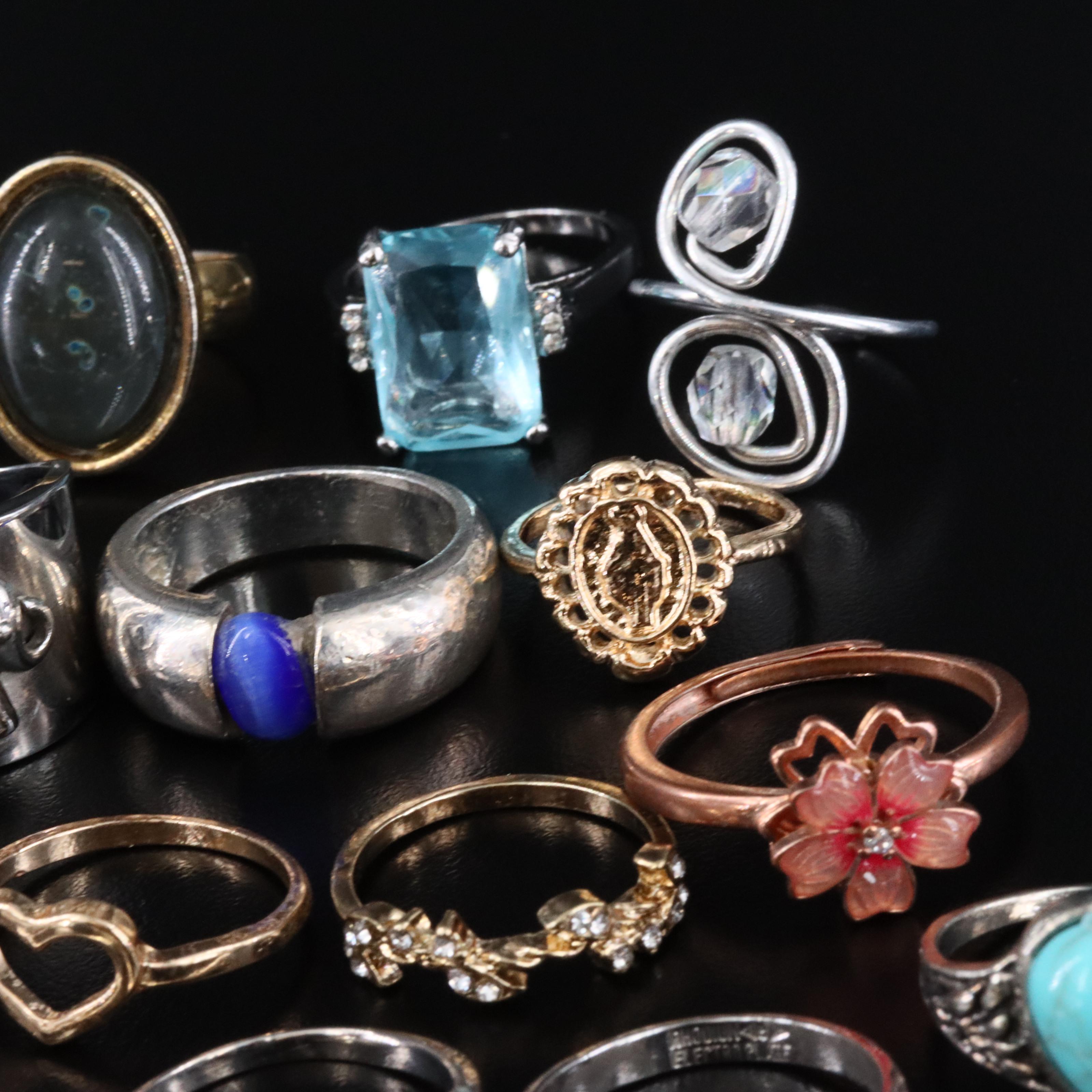 Spinner Ring, Floral Motifs and Navette Featured in Ring Collection
