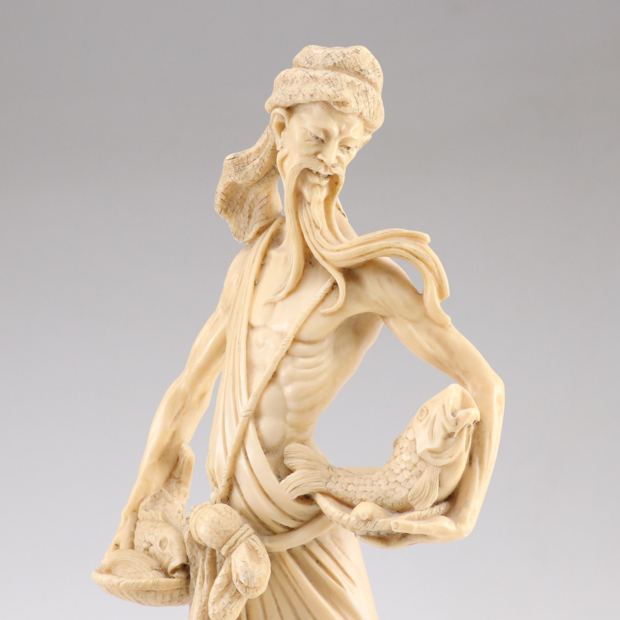 Pair of Chinese Fisherman Statues