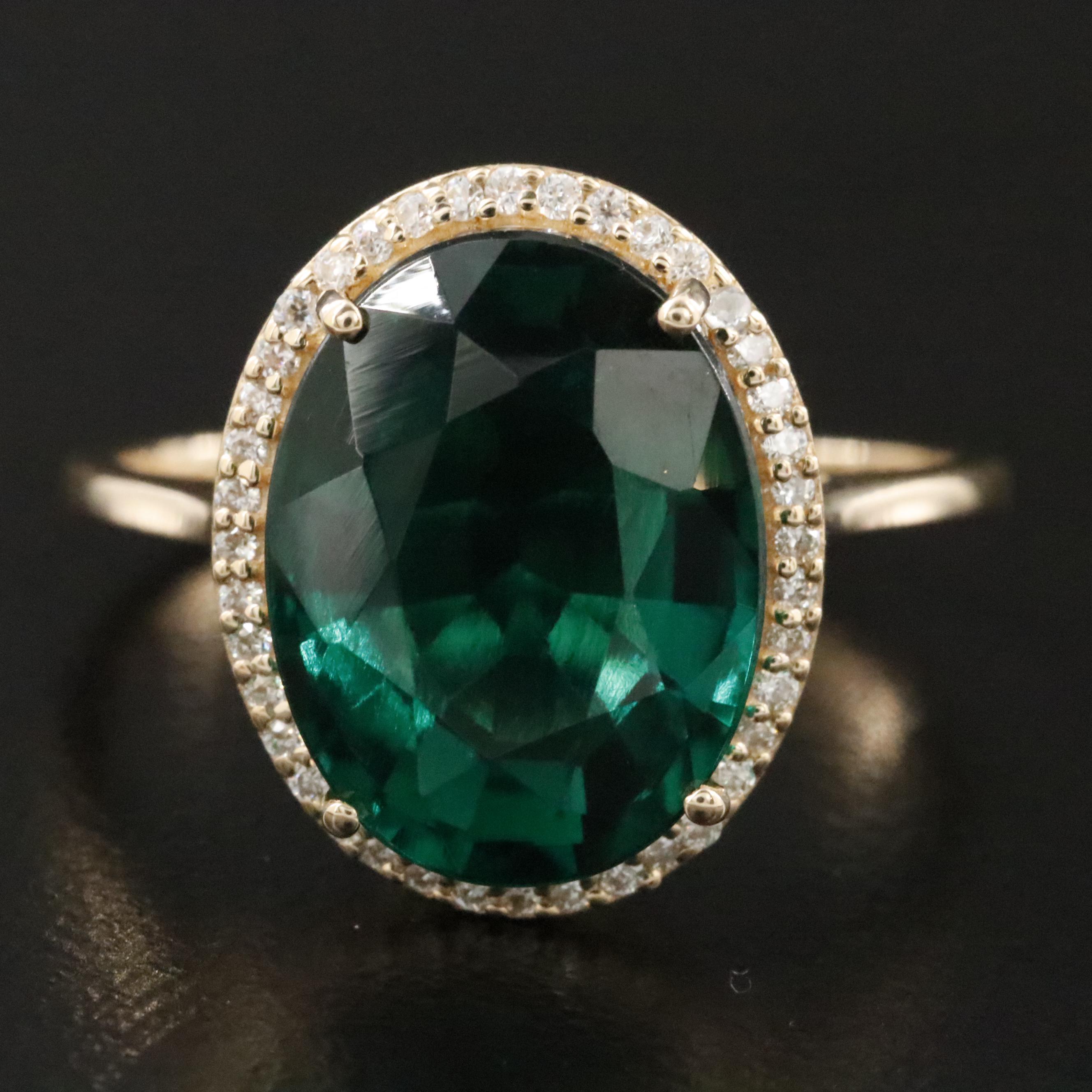 14K 4.33 CT Emerald and Moissanite Ring