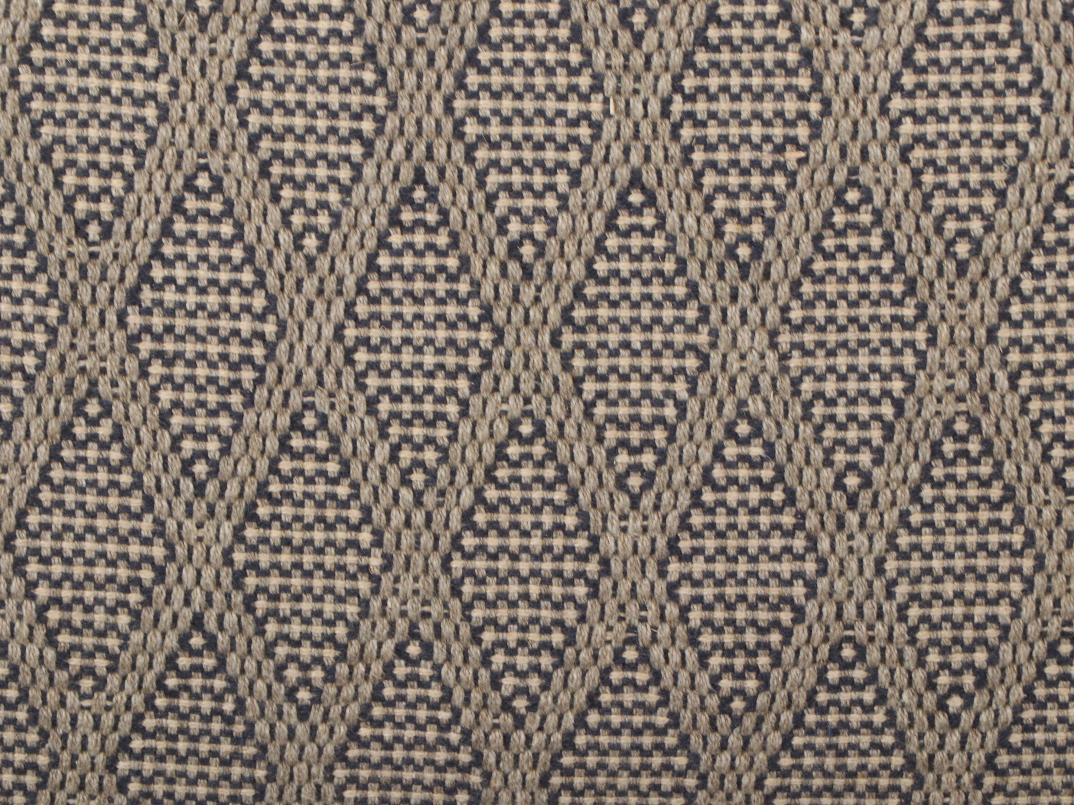 Contemporary Woven Fabric Slipcovered Armchair and Ottoman