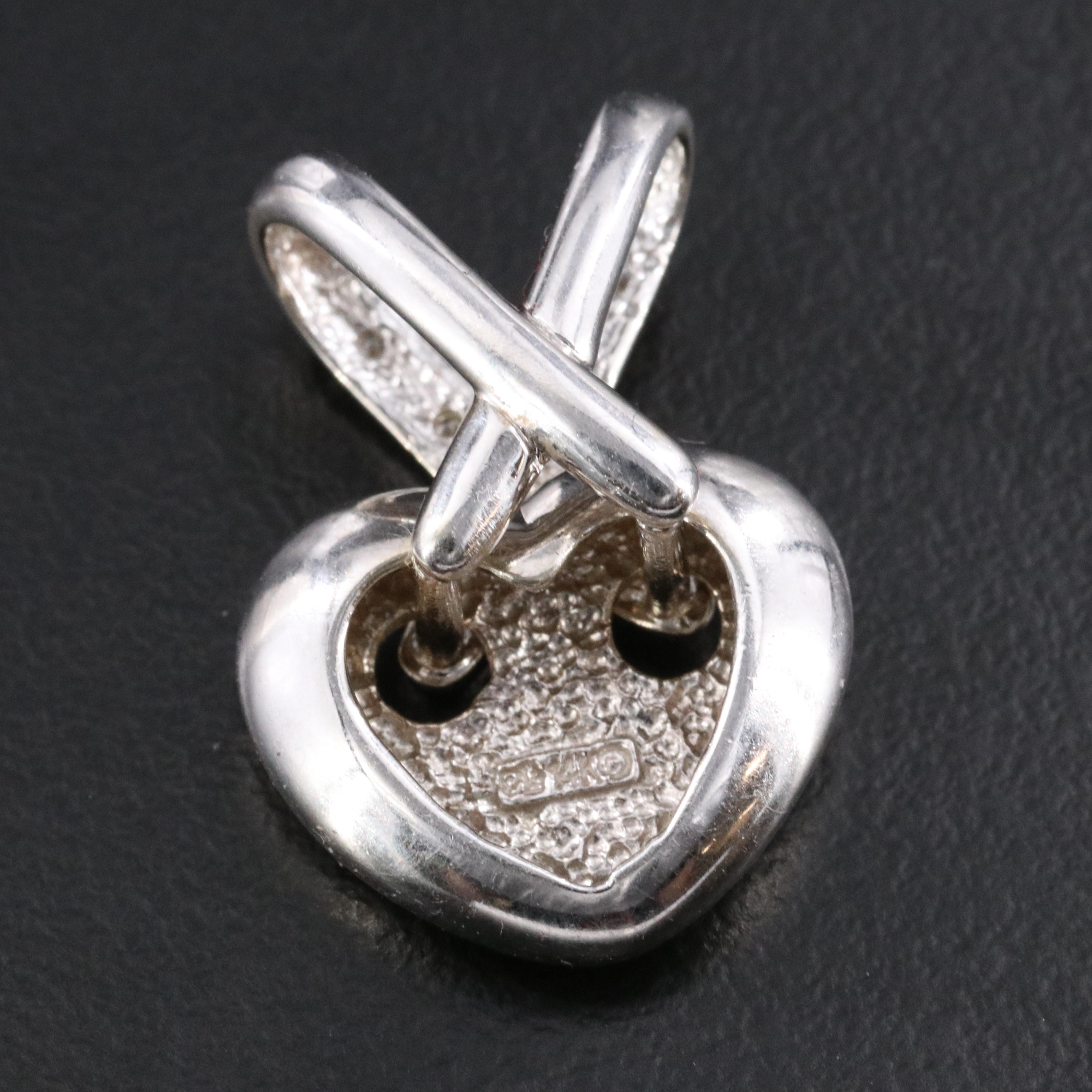 14K 0.05 CTW Diamond Heart Criss Cross Pendant