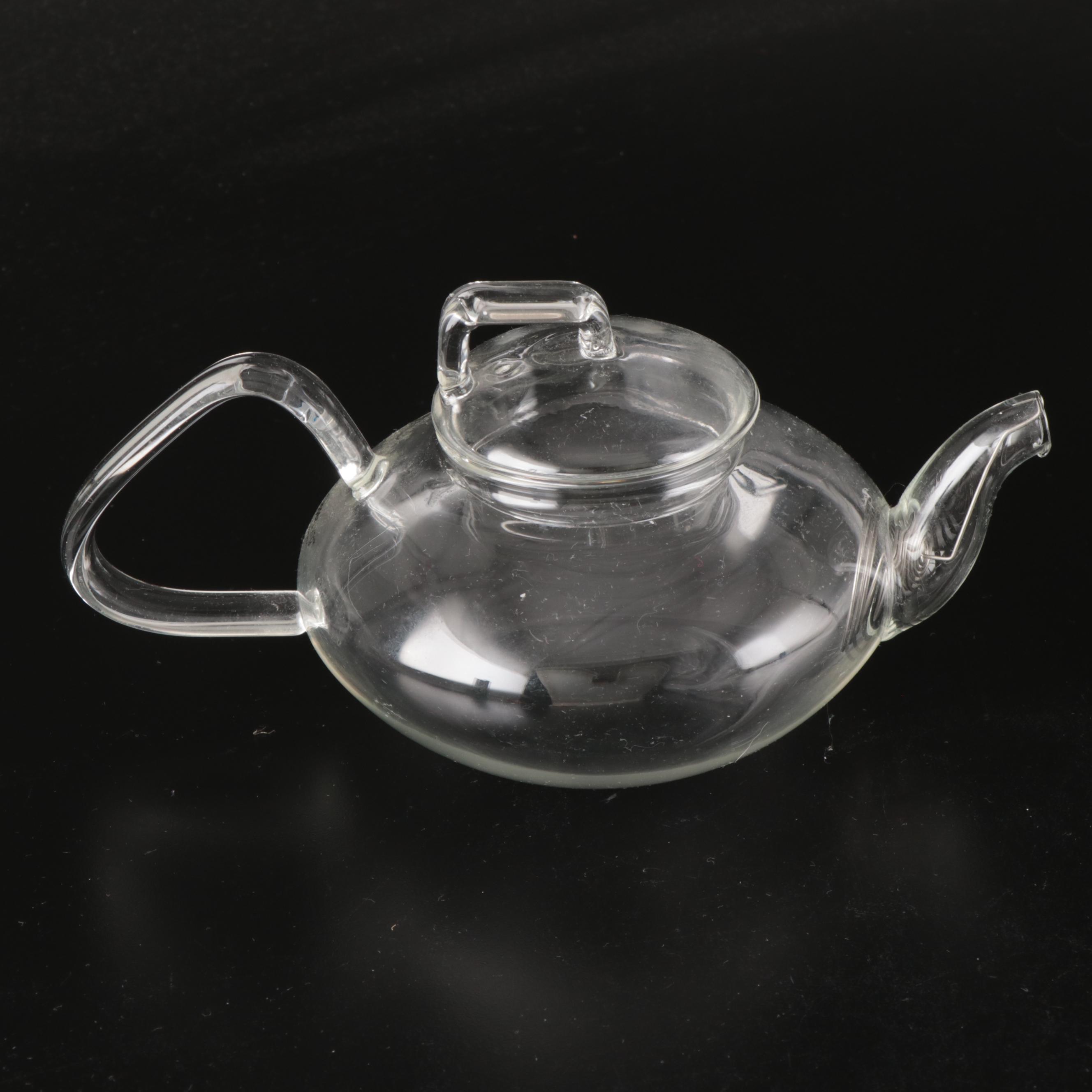 Kromex Metal Lazy Susan and Other Glass Teapots with Bowls and Underplates