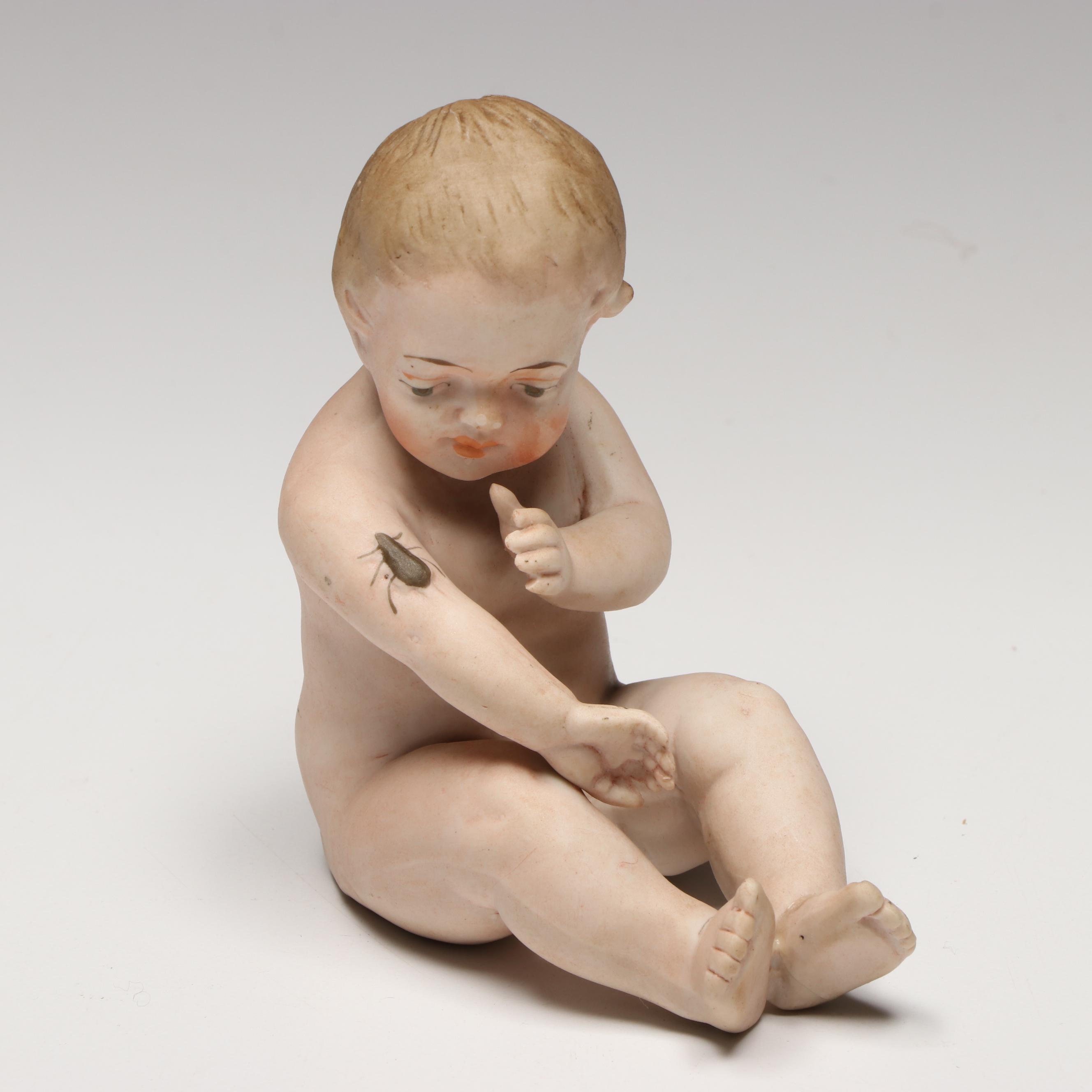 Collection of Porcelain Baby Figurines