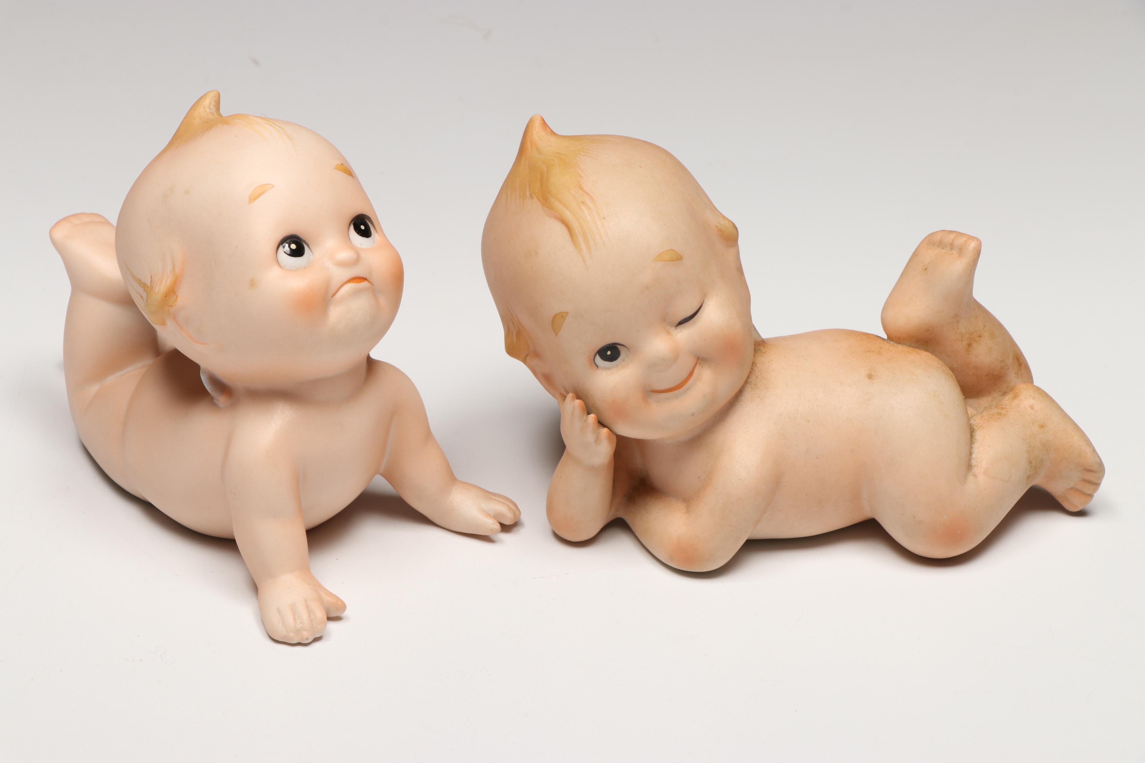 Collection of Porcelain Baby Figurines