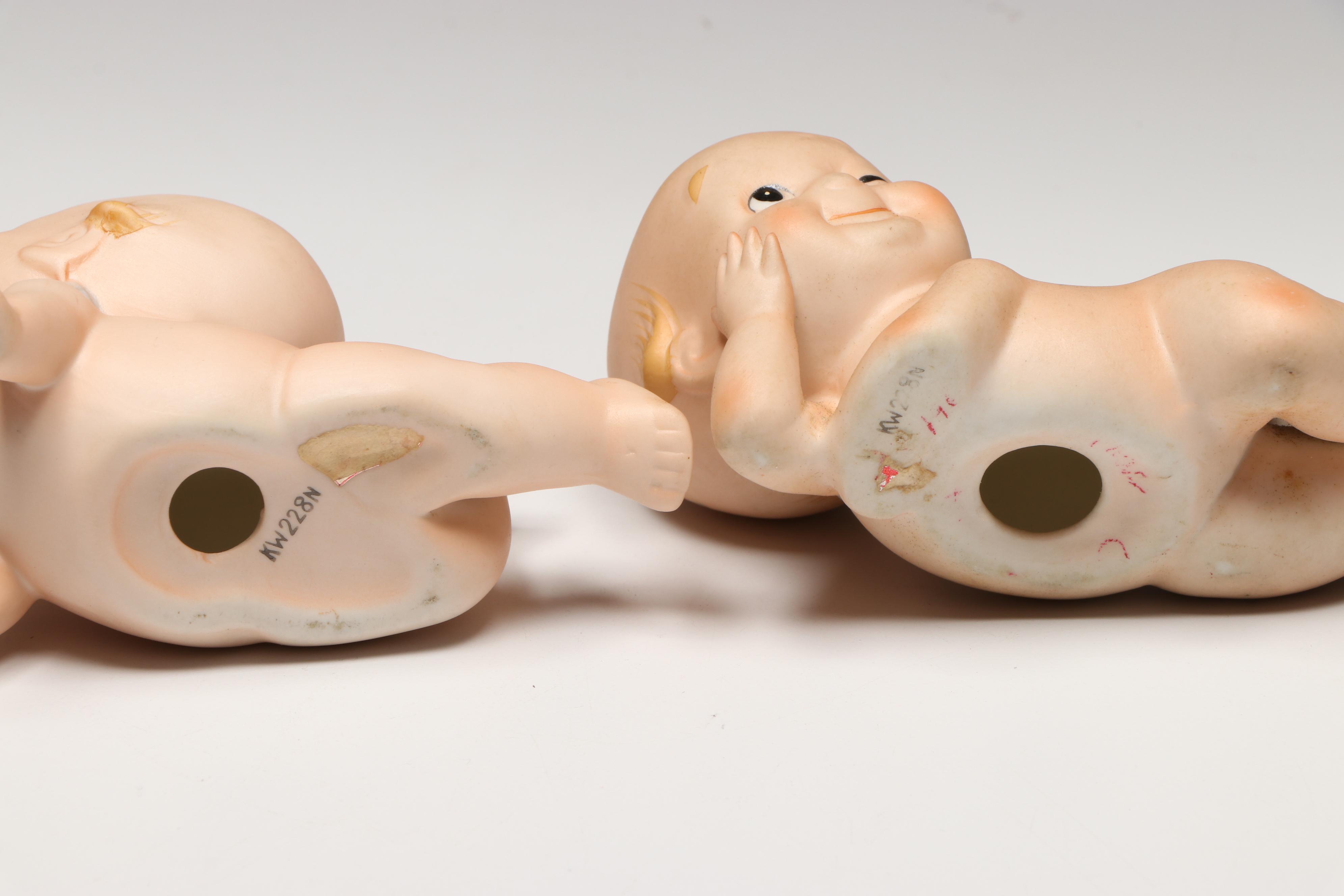 Collection of Porcelain Baby Figurines