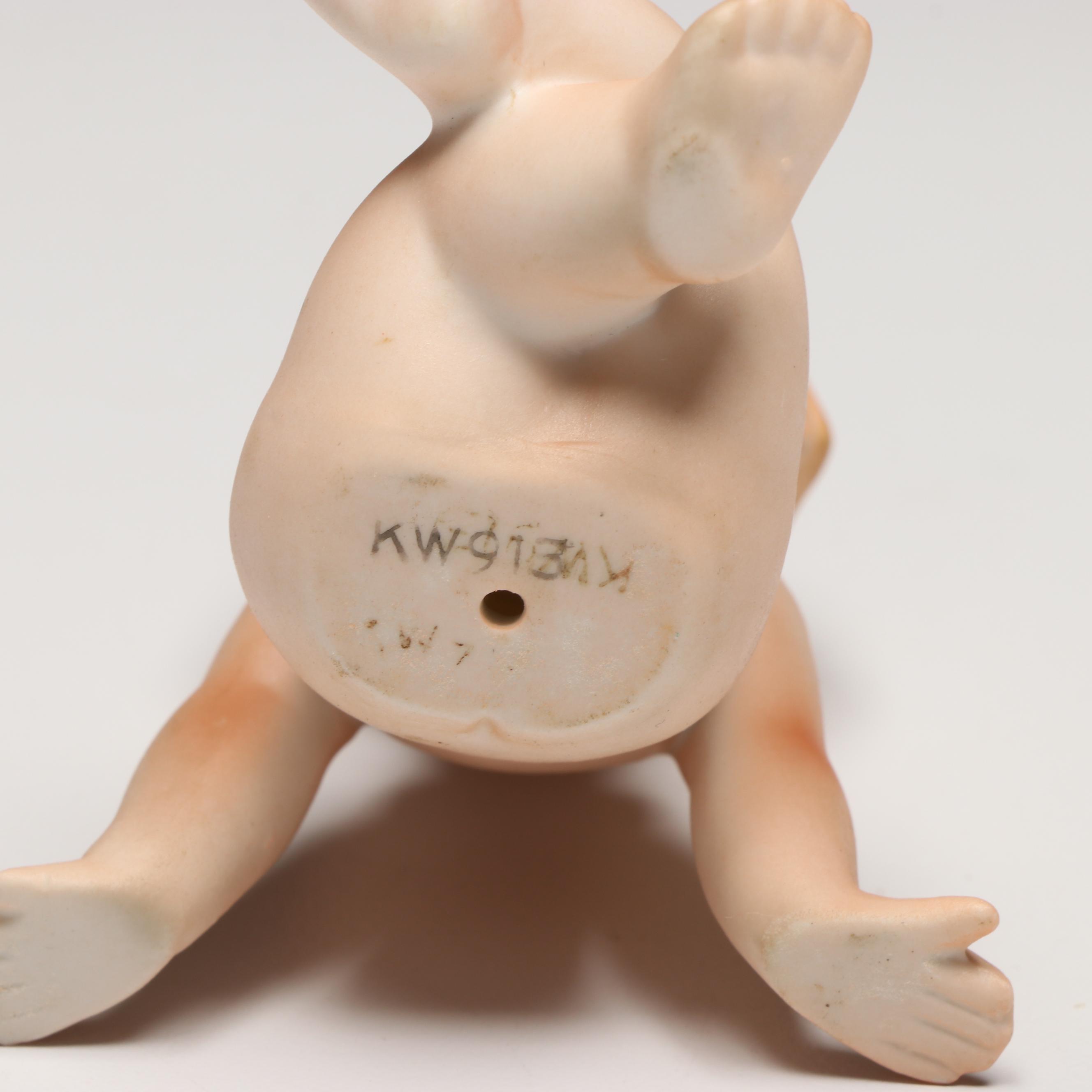 Collection of Porcelain Baby Figurines