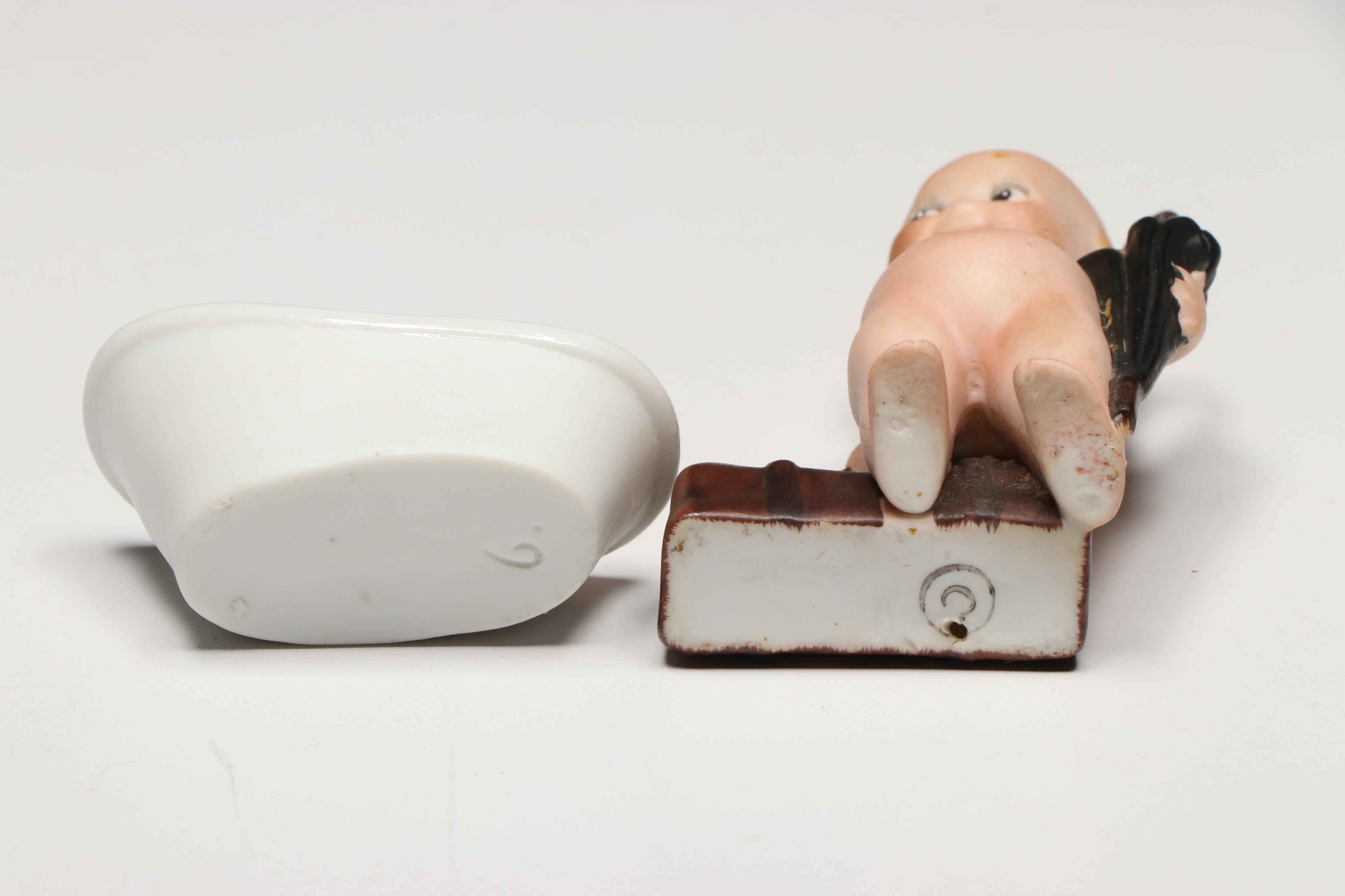 Collection of Porcelain Baby Figurines