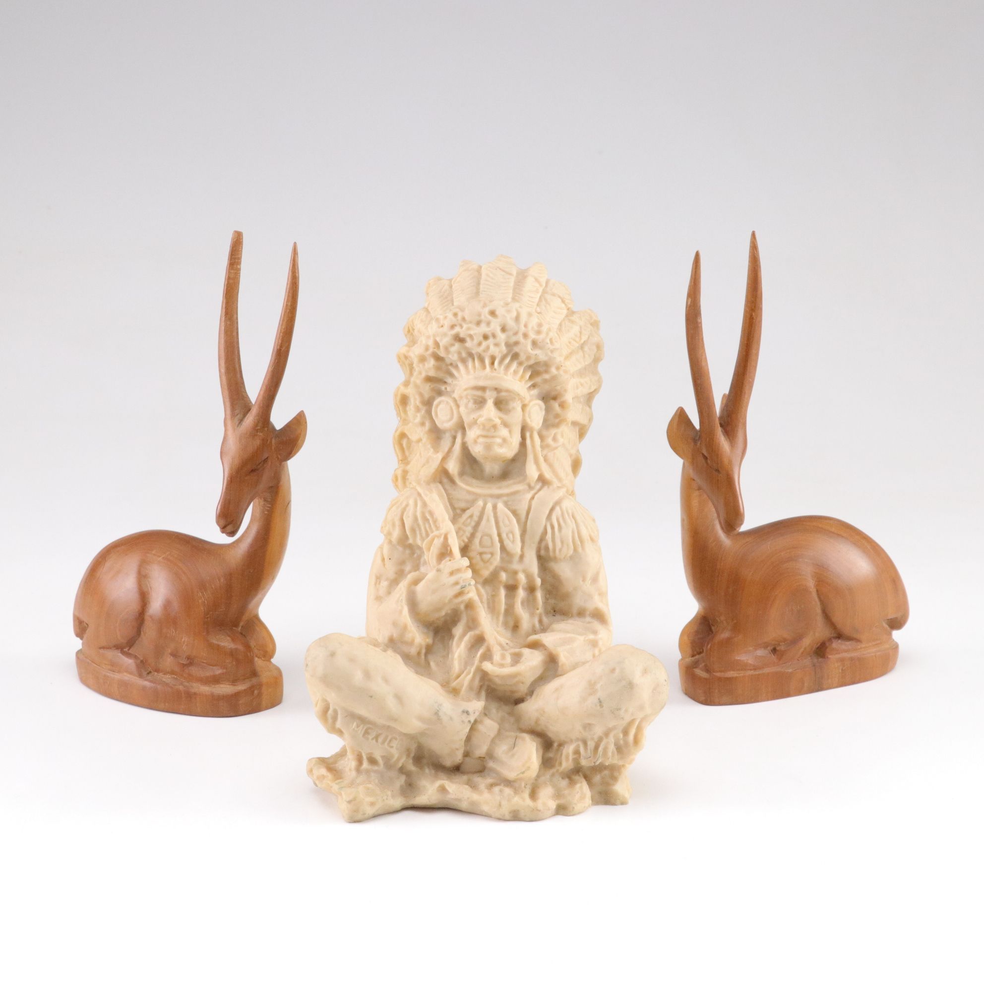 Hand-Carved Resin Seated Native Chief and Teak Gazelle Figurines