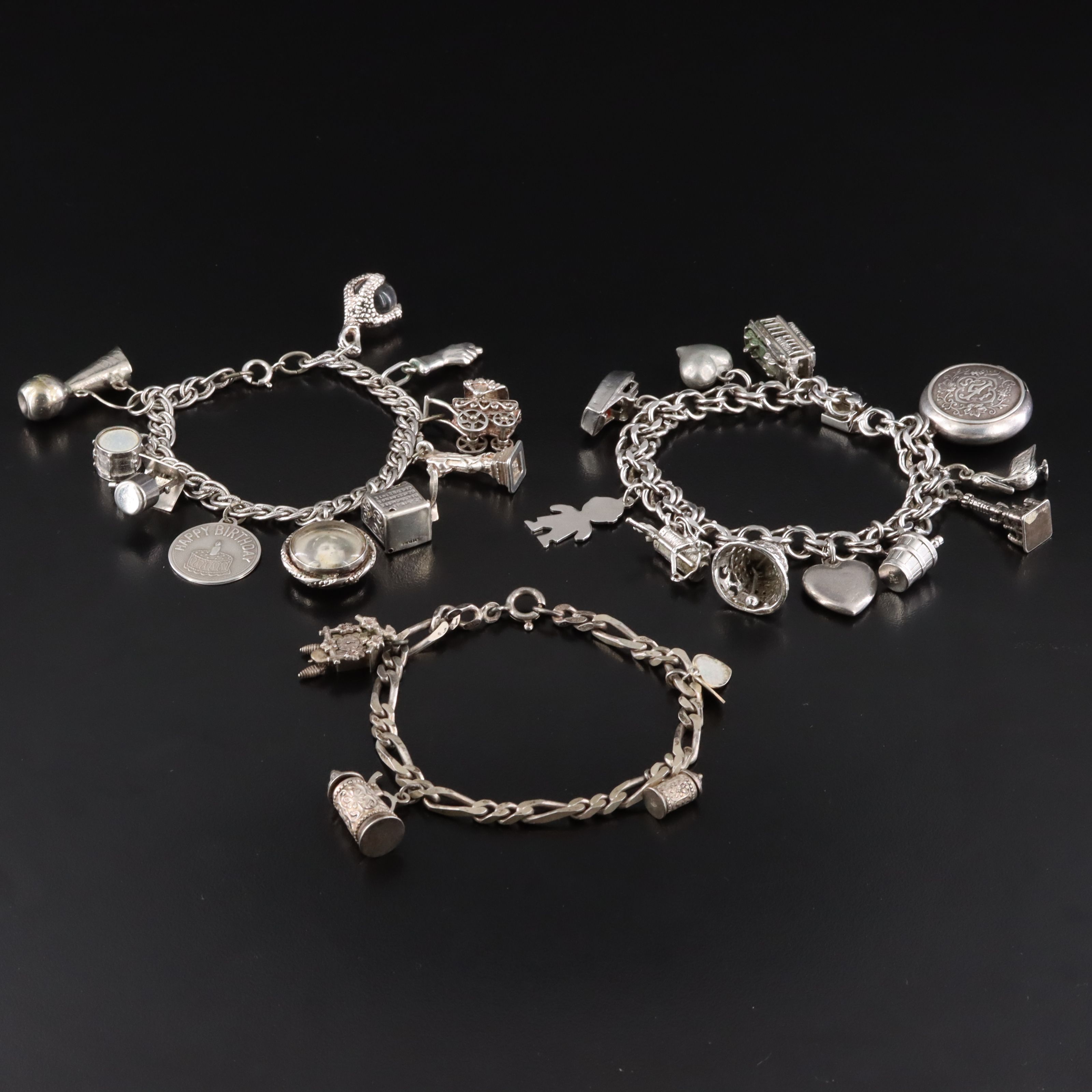 Vintage Charm Bracelets Featuring Sterling, German Themed Charms and 800 Silver