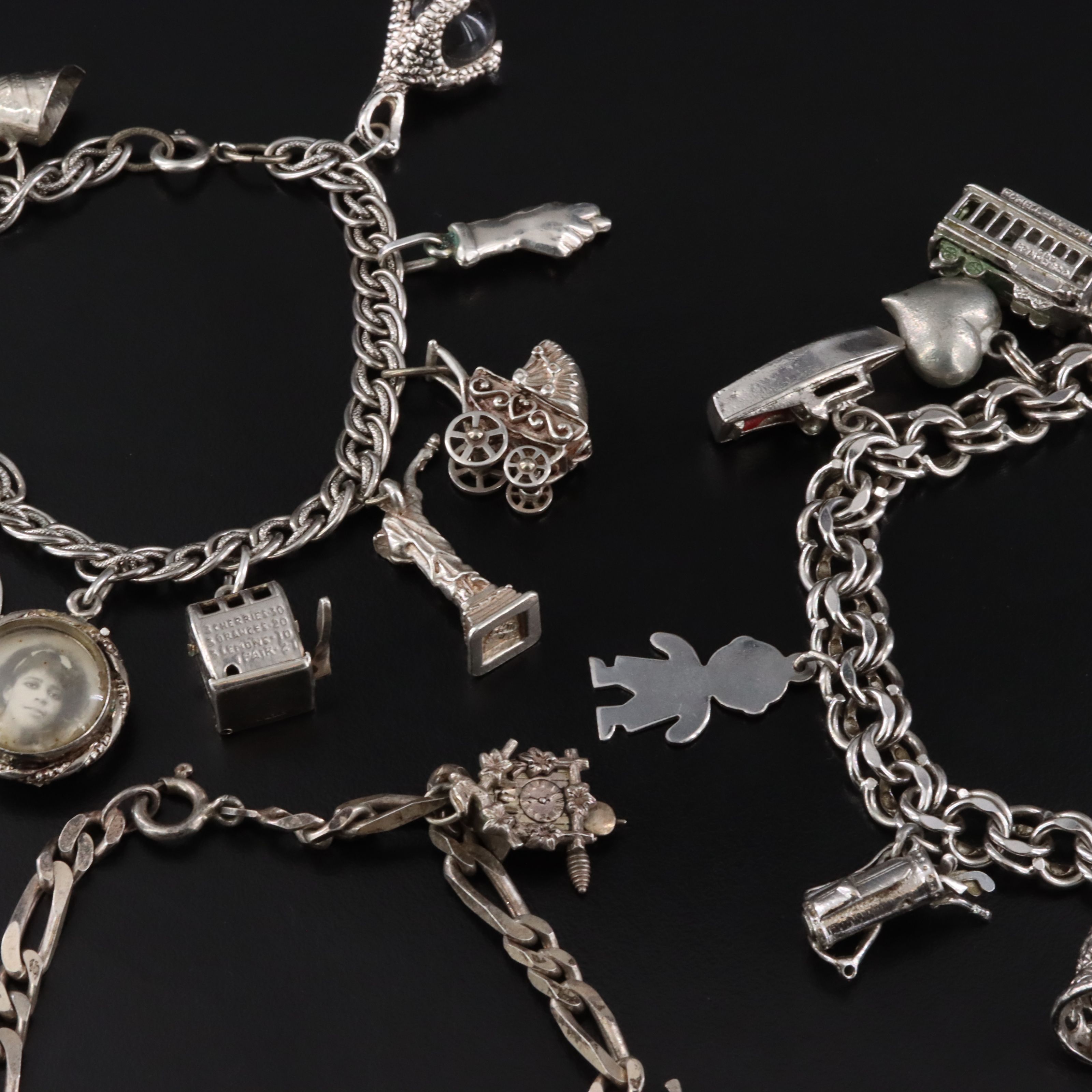 Vintage Charm Bracelets Featuring Sterling, German Themed Charms and 800 Silver