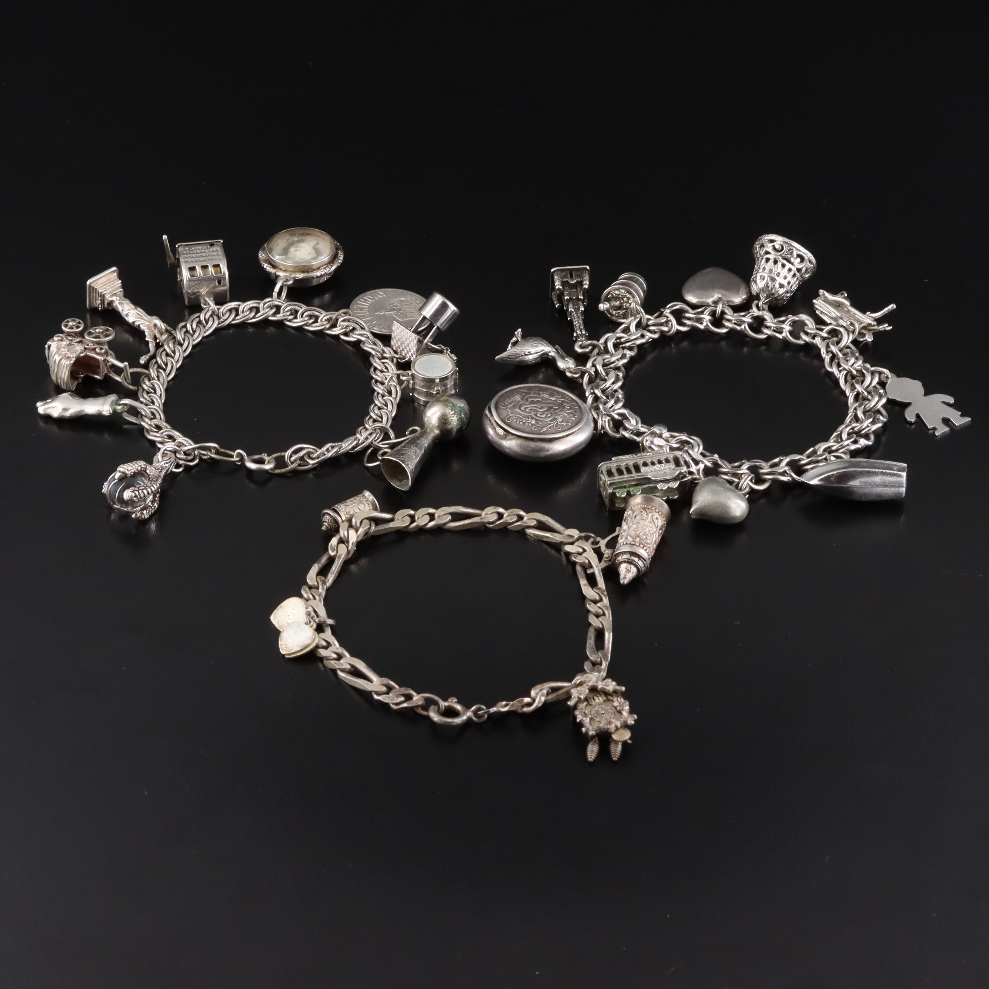 Vintage Charm Bracelets Featuring Sterling, German Themed Charms and 800 Silver