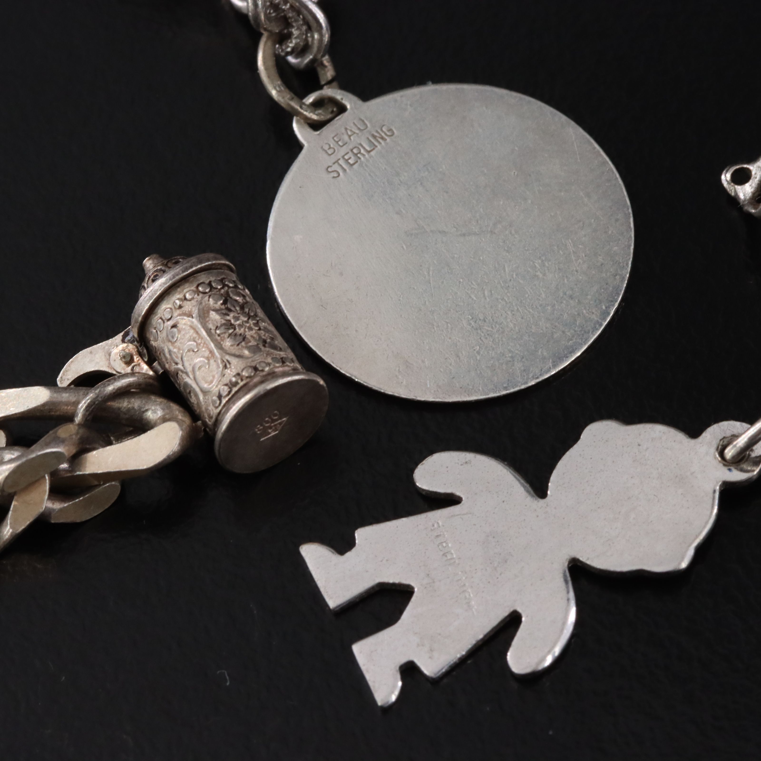 Vintage Charm Bracelets Featuring Sterling, German Themed Charms and 800 Silver