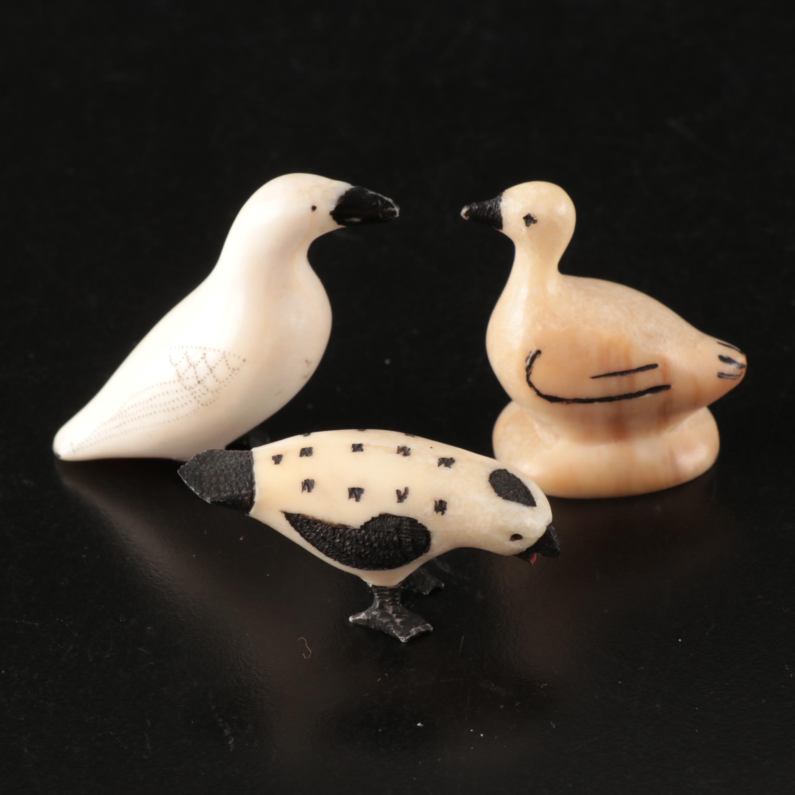 Inuit and Arctic Indigenous Carved Walrus Ivory Hunter in Kayak and Animals