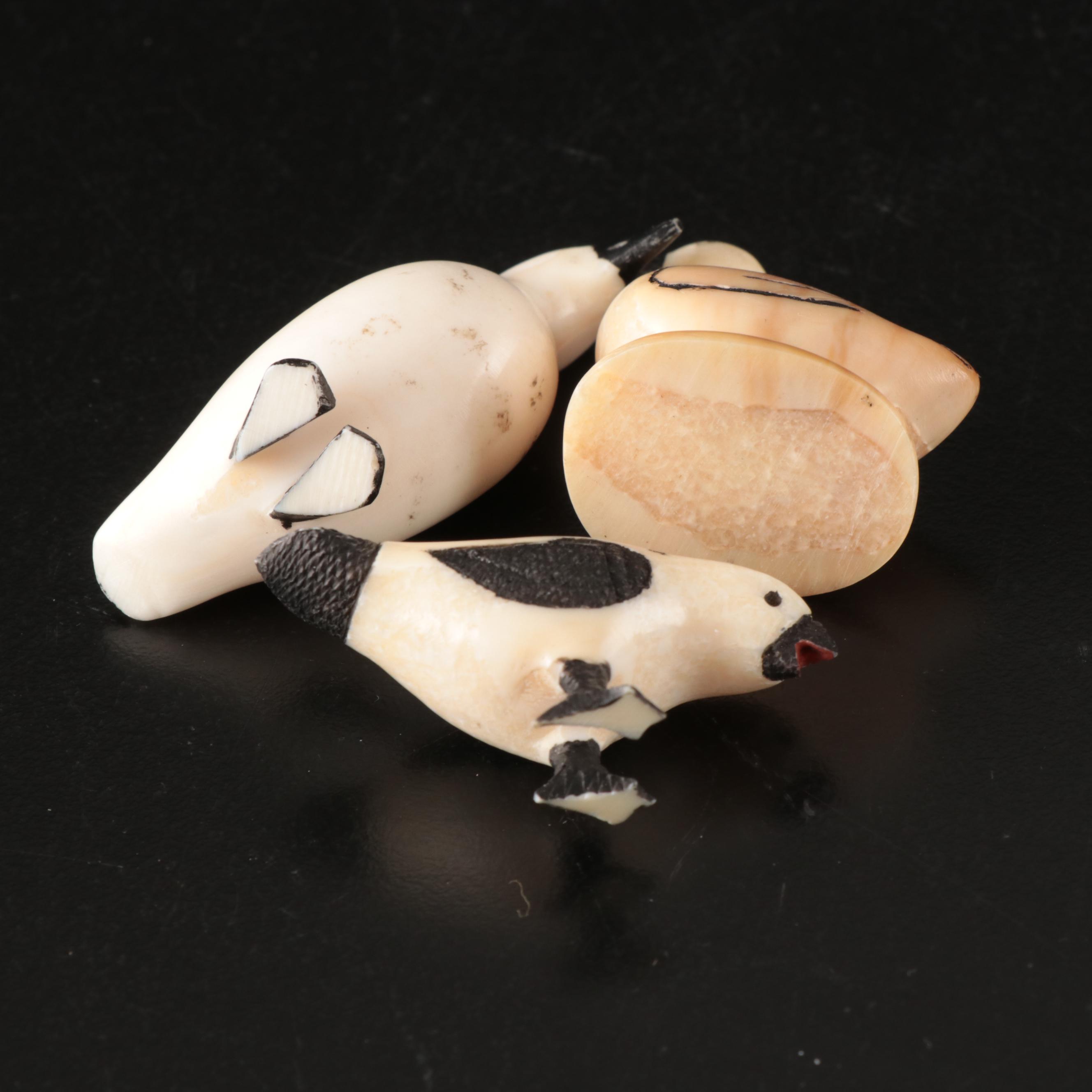 Inuit and Arctic Indigenous Carved Walrus Ivory Hunter in Kayak and Animals