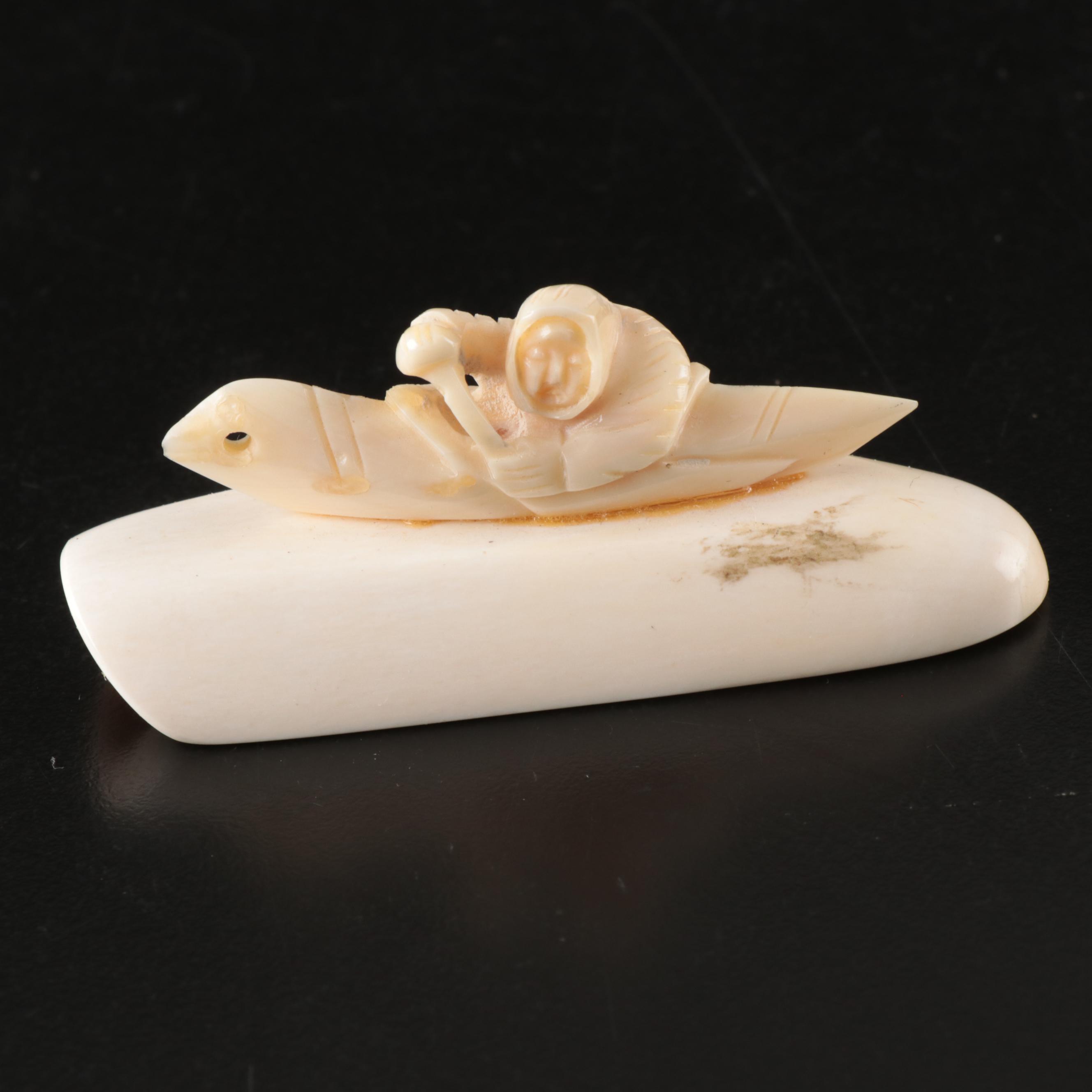 Inuit and Arctic Indigenous Carved Walrus Ivory Hunter in Kayak and Animals