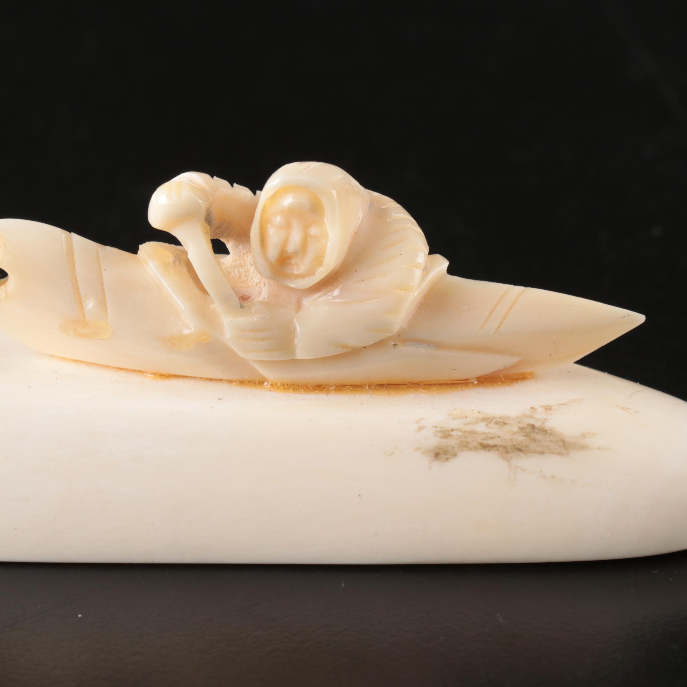 Inuit and Arctic Indigenous Carved Walrus Ivory Hunter in Kayak and Animals