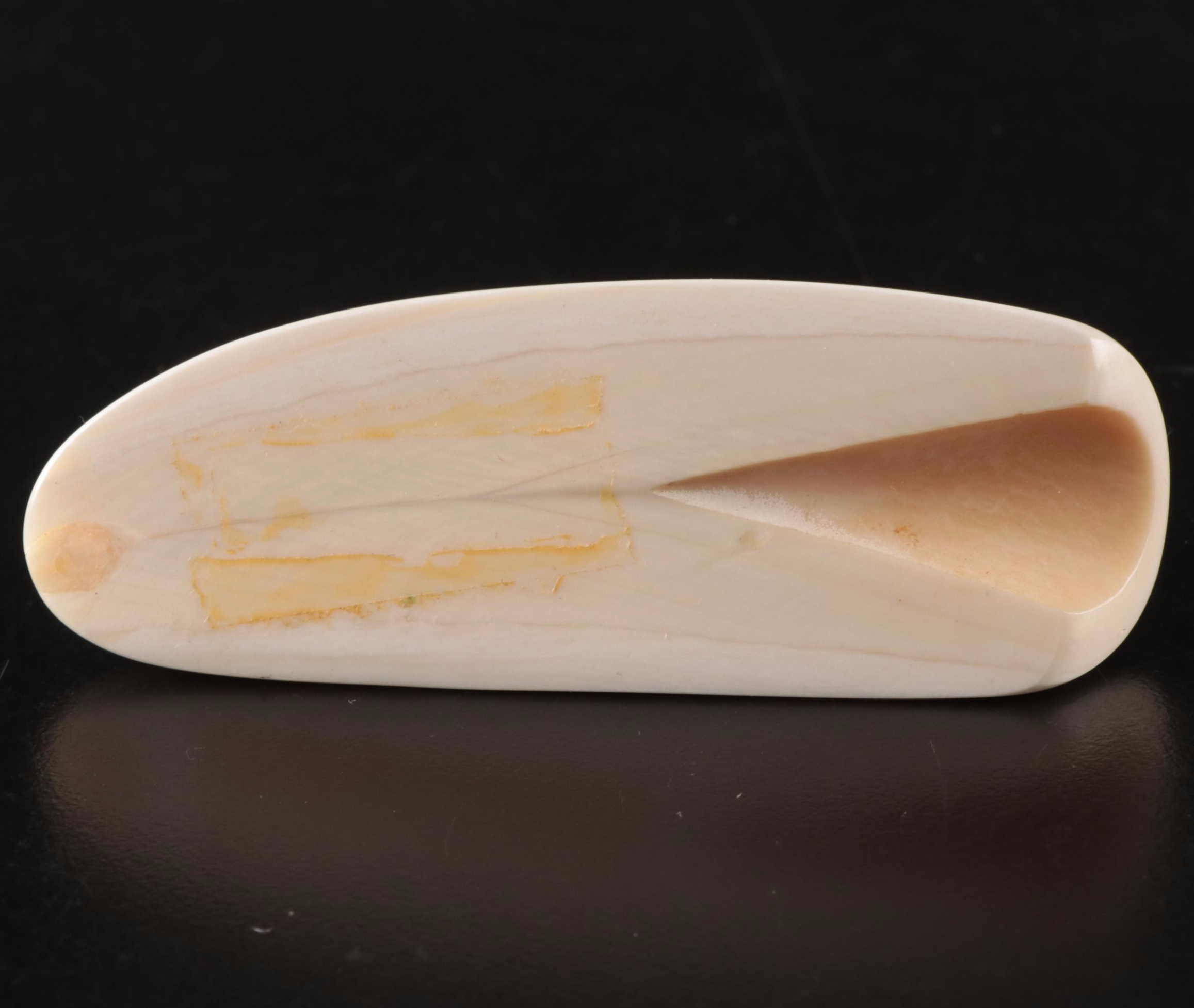 Inuit and Arctic Indigenous Carved Walrus Ivory Hunter in Kayak and Animals