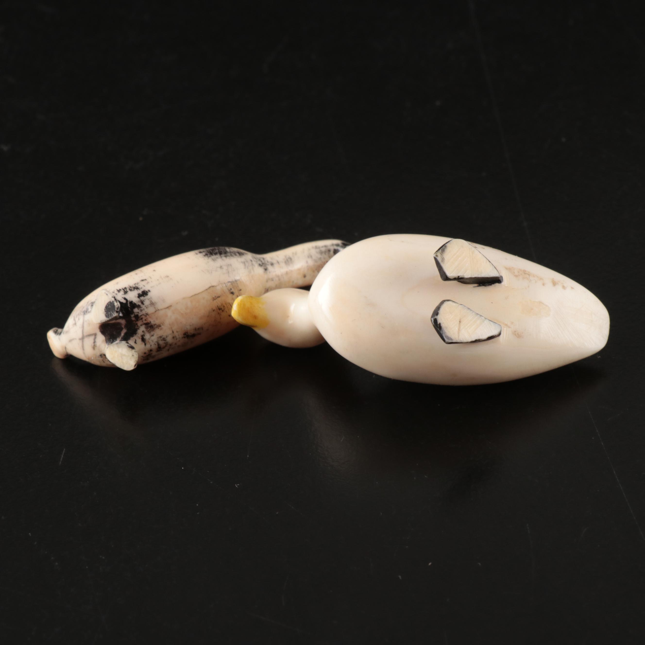 Inuit and Arctic Indigenous Carved Walrus Ivory Hunter in Kayak and Animals