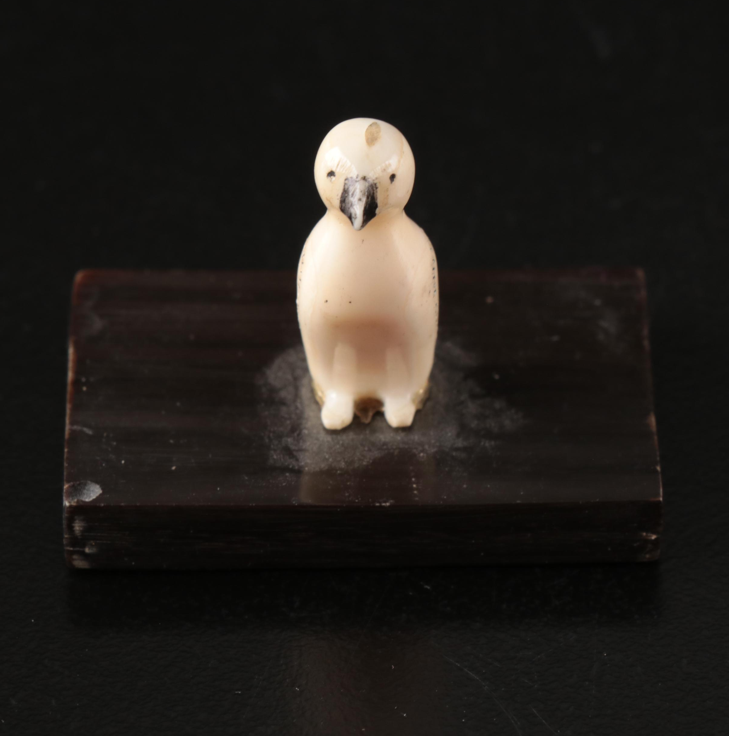 Inuit and Arctic Indigenous Carved Walrus Ivory Hunter in Kayak and Animals