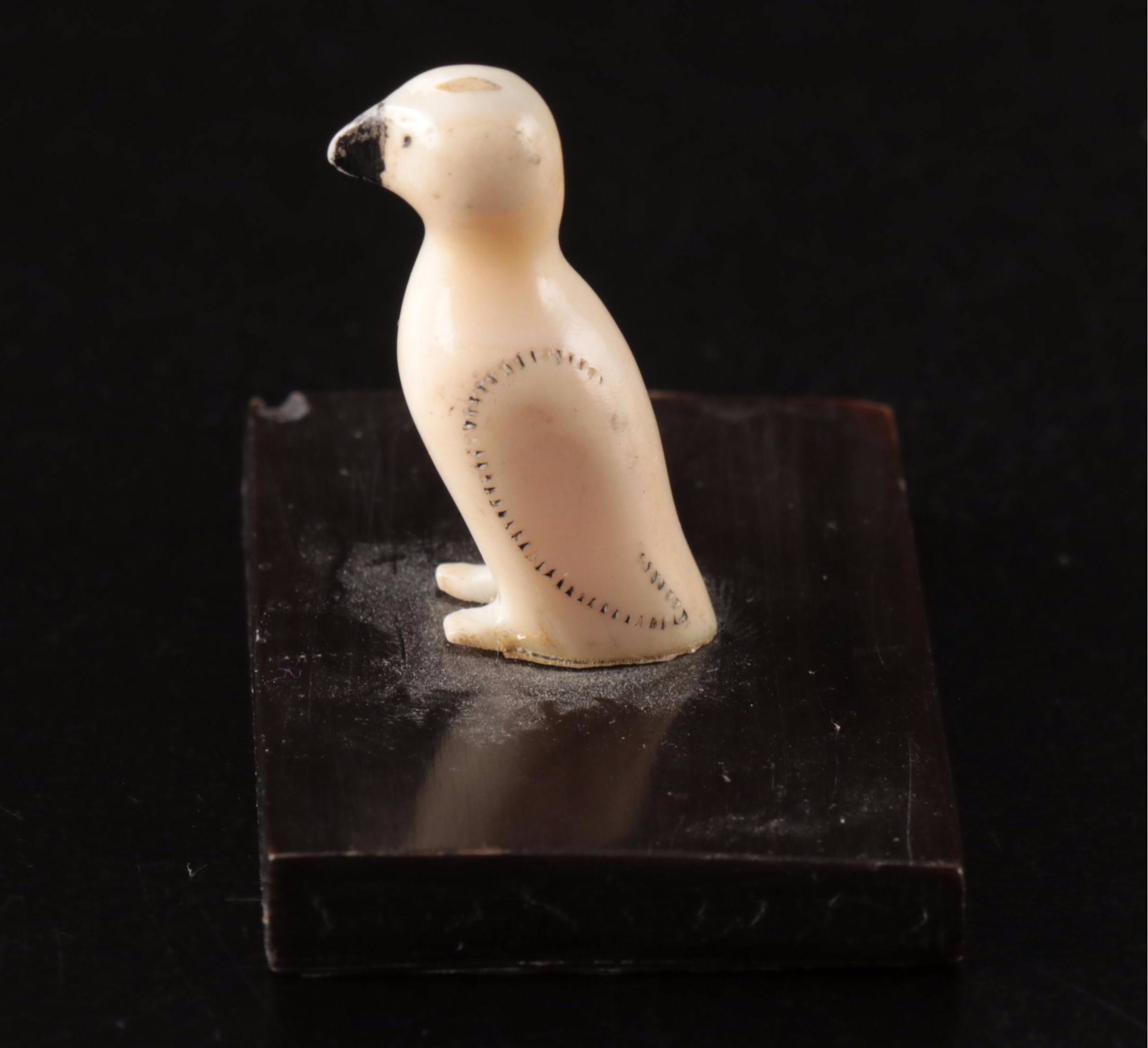 Inuit and Arctic Indigenous Carved Walrus Ivory Hunter in Kayak and Animals