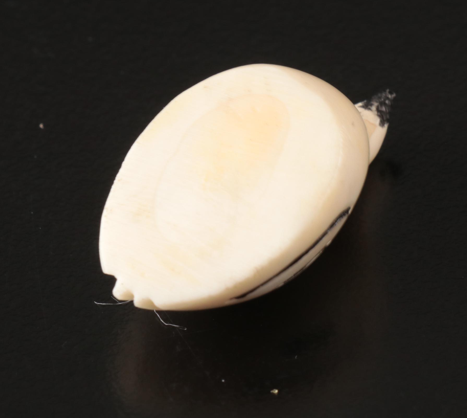 Inuit and Arctic Indigenous Carved Walrus Ivory Hunter in Kayak and Animals