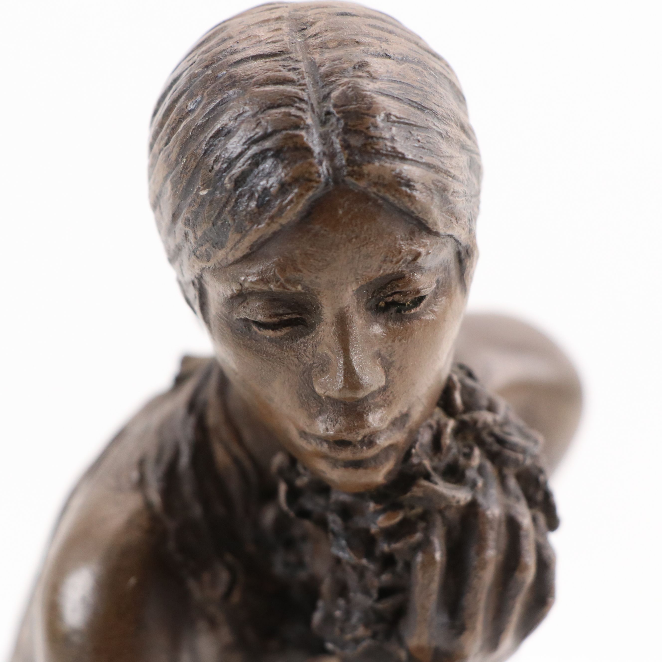 M. Stelzer Cast Spelter Sculpture of Kneeling Figure with Flowers