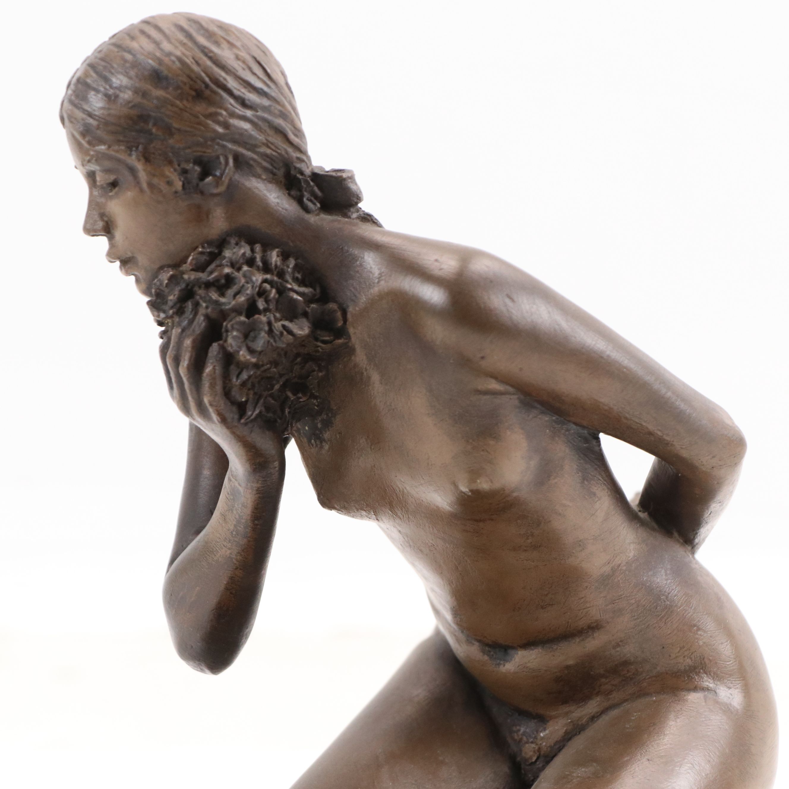 M. Stelzer Cast Spelter Sculpture of Kneeling Figure with Flowers