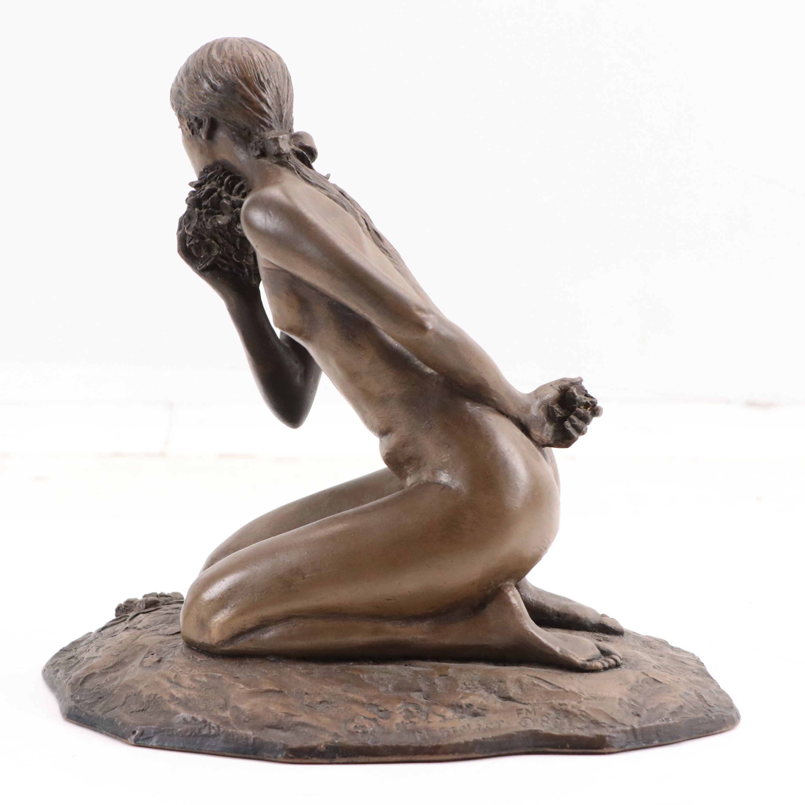 M. Stelzer Cast Spelter Sculpture of Kneeling Figure with Flowers