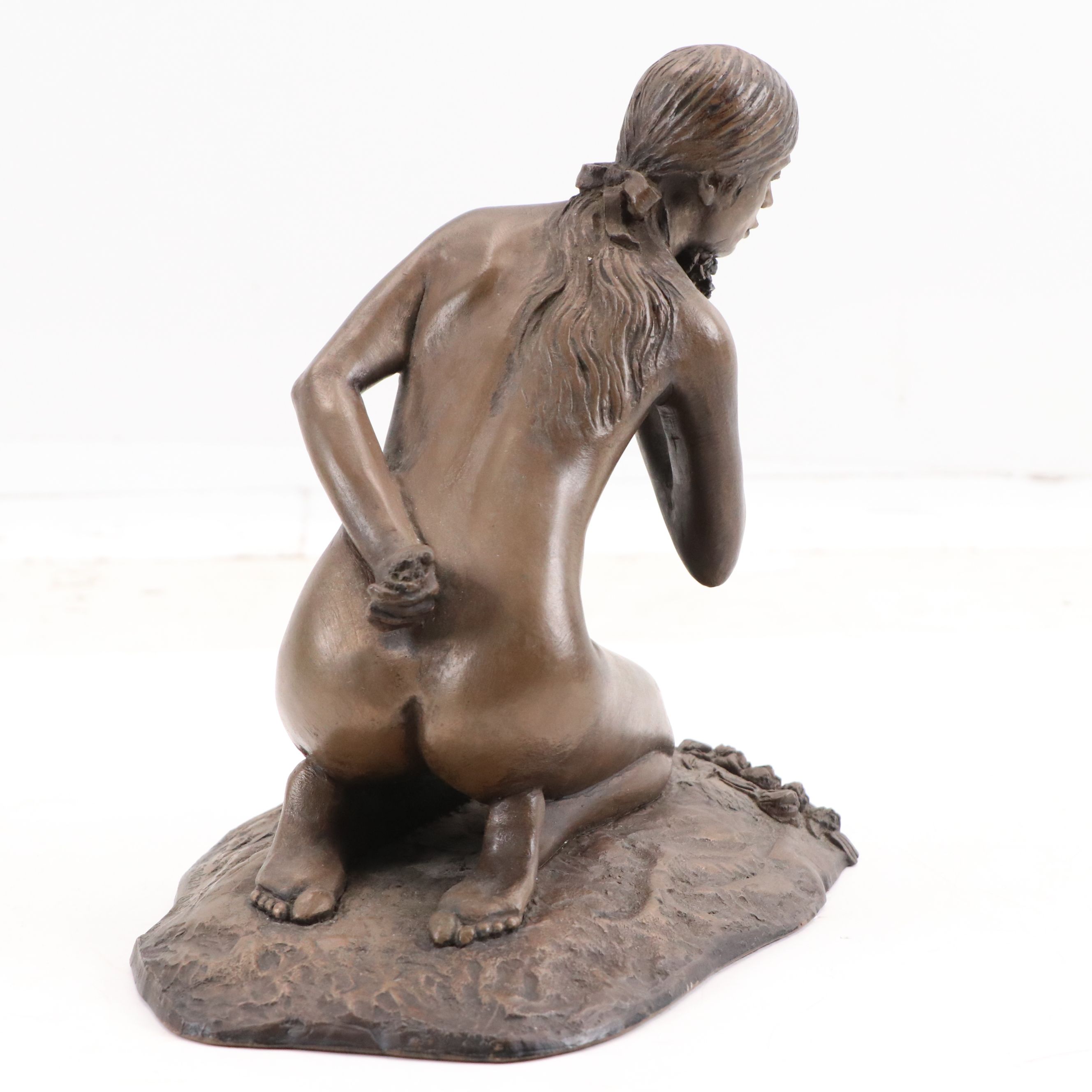 M. Stelzer Cast Spelter Sculpture of Kneeling Figure with Flowers