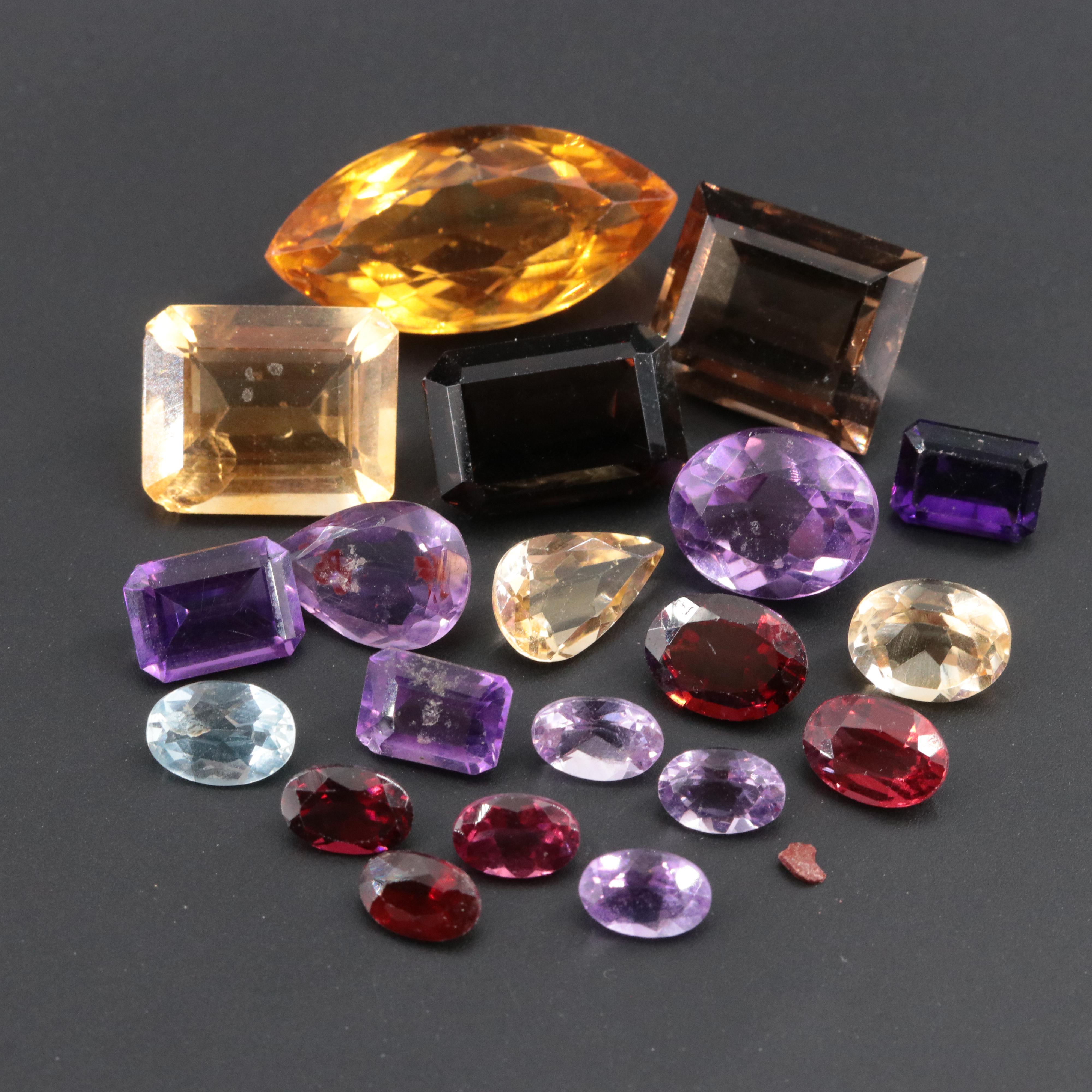Loose 37.89 CTW Gemstone Lot Including Amethyst, Smoky Quartz and Garnet